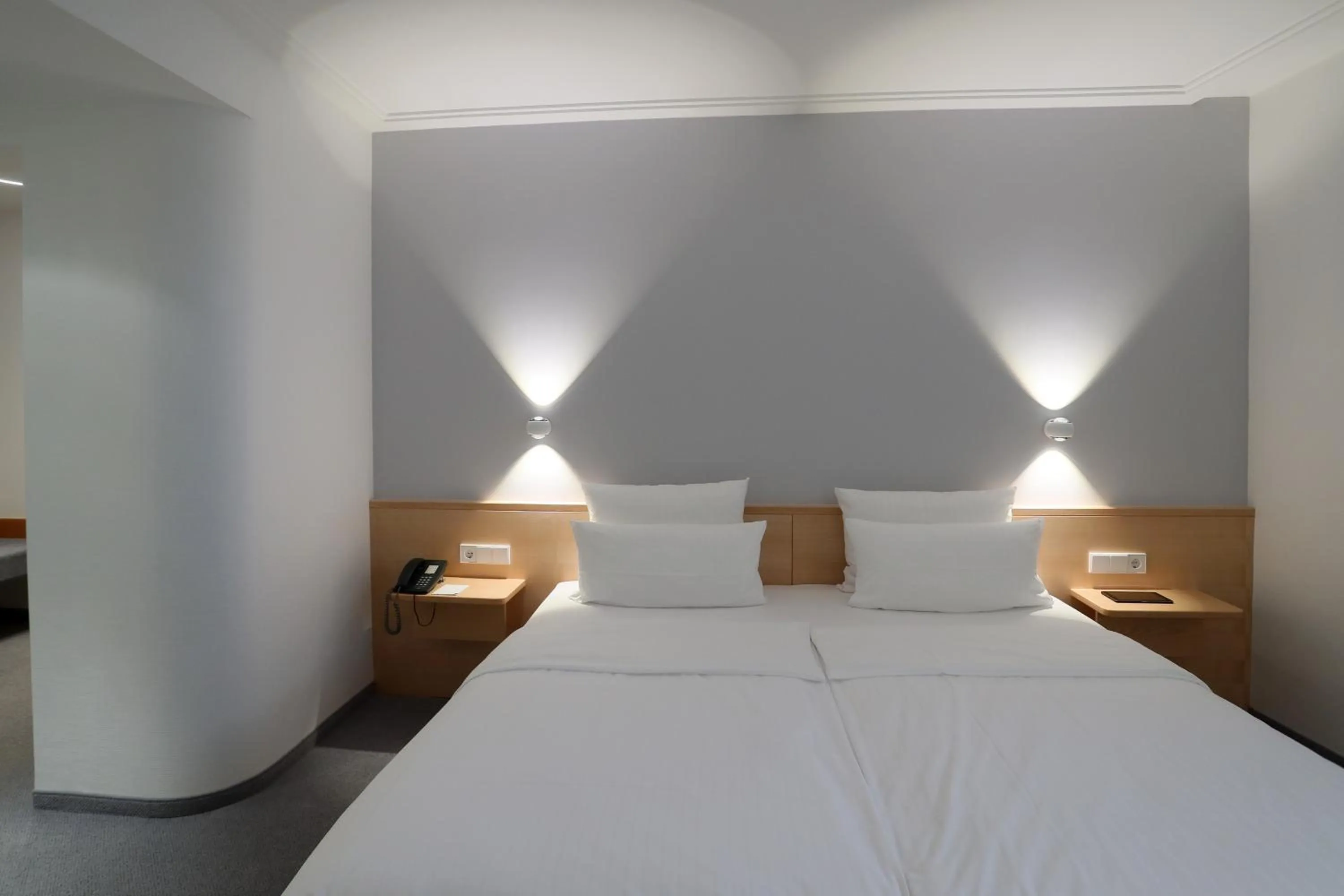 Bed in MOMA1890 Boutique Hotel