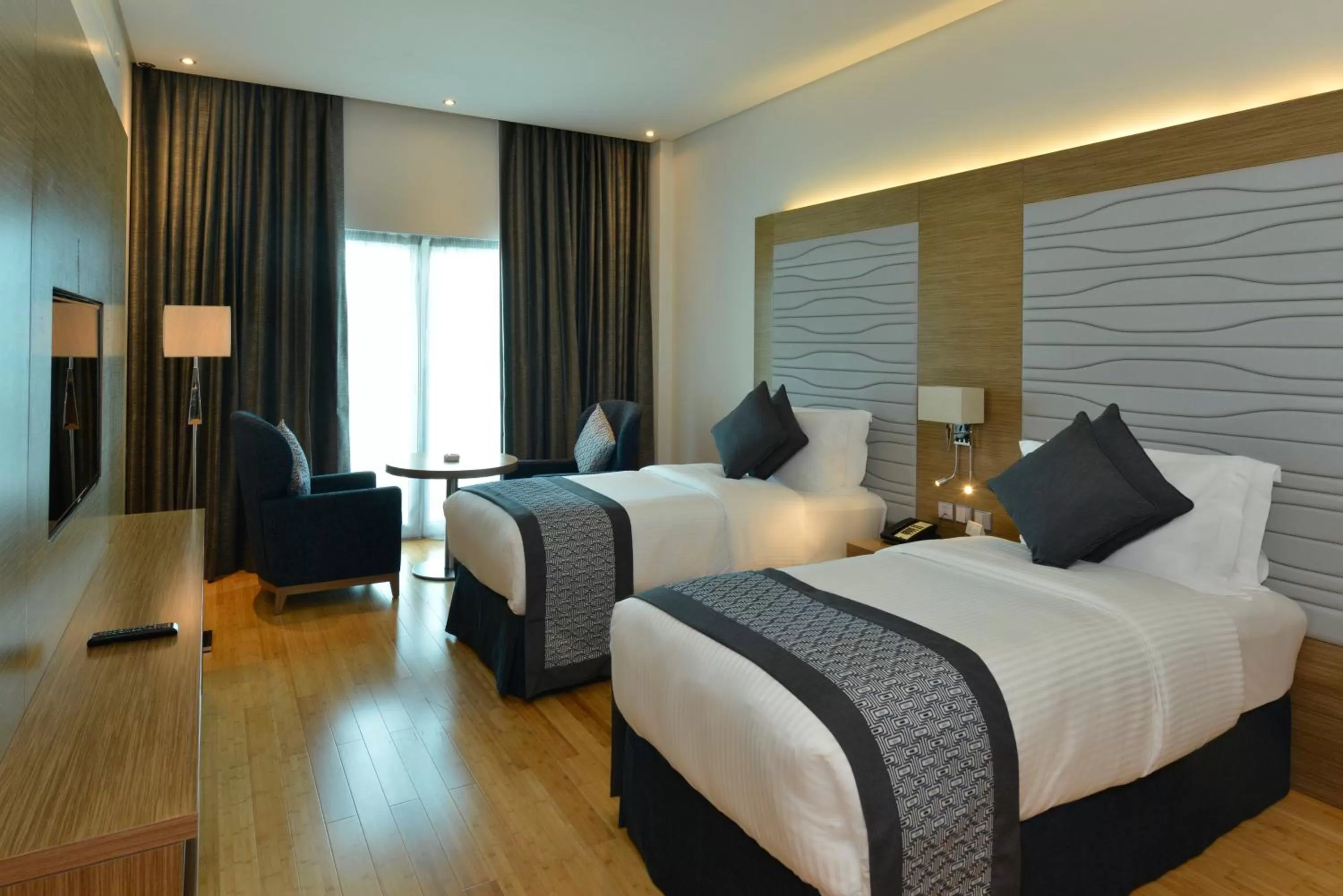 Shower, Bed in Ramada by Wyndham Manama City Centre