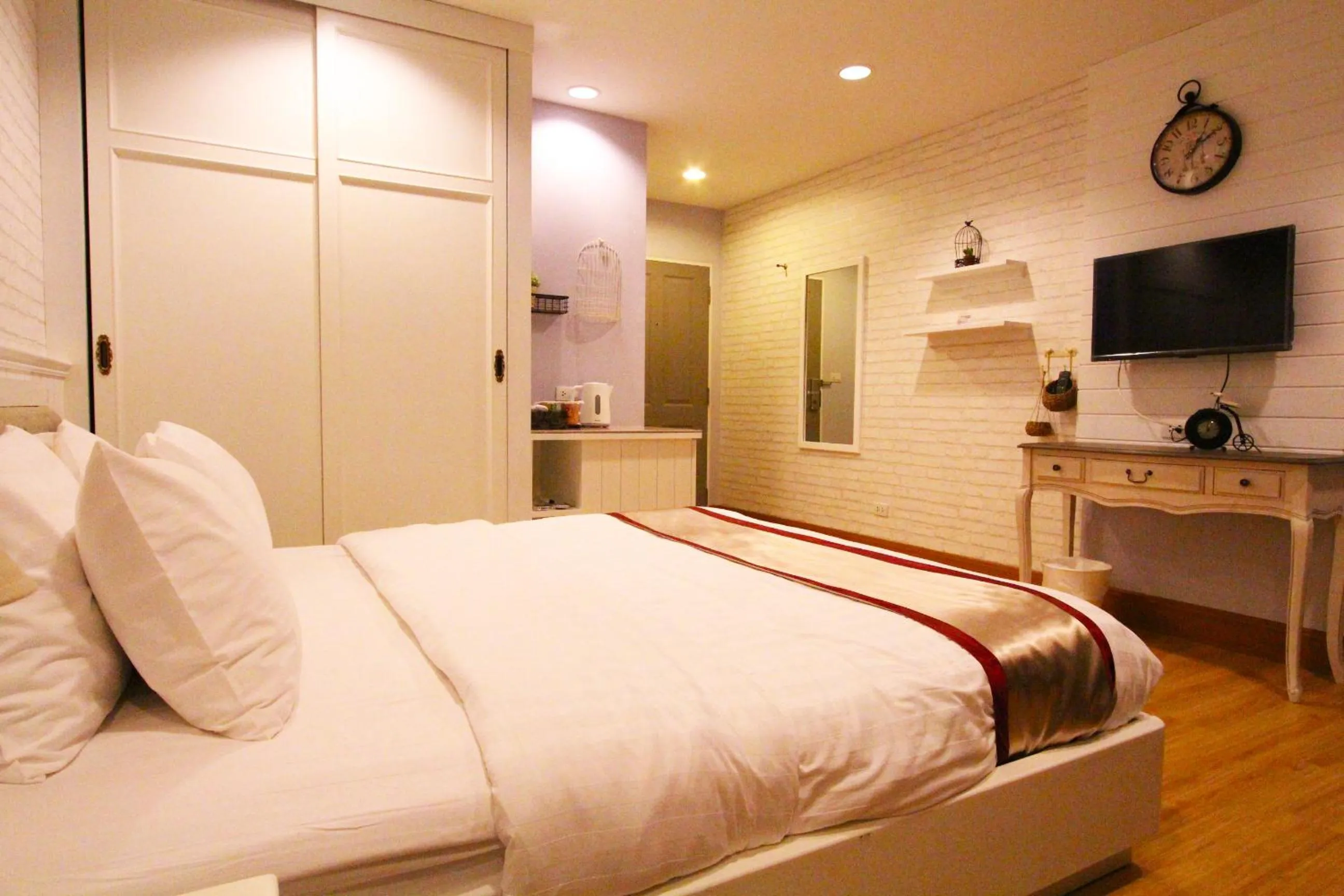 Bed in At Residence Suvarnabhumi Hotel