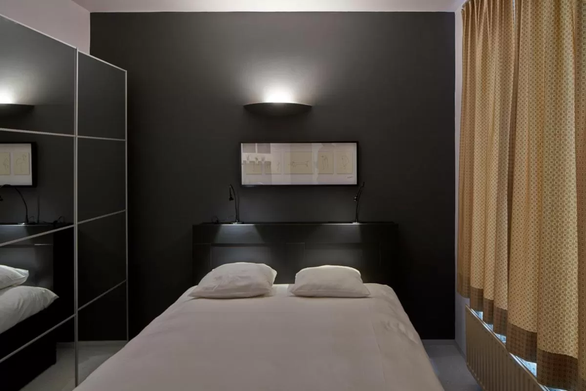 Bed in Alpha Hotel and Aparthotel