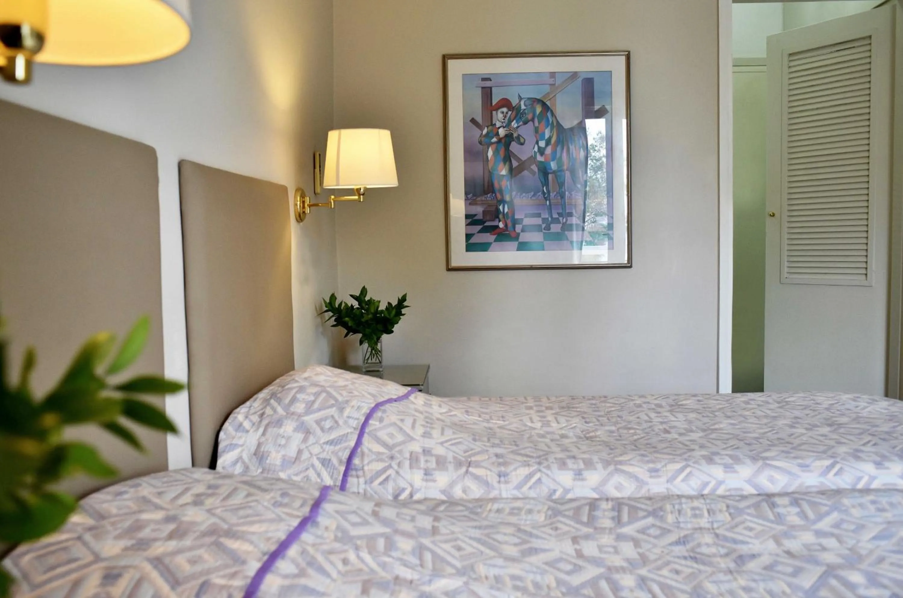 Bed in Karystion Hotel