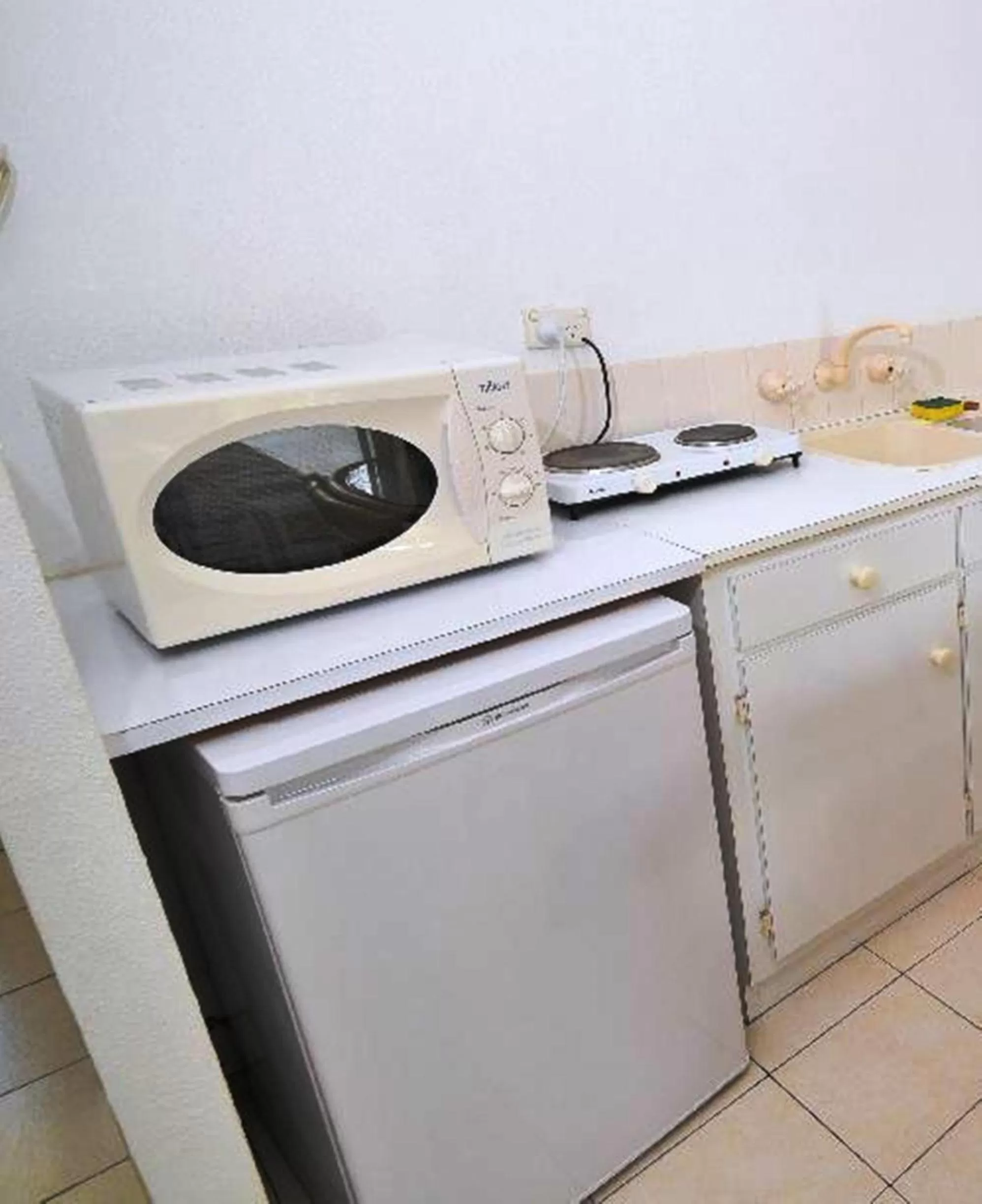 Kitchen or kitchenette in The Melanesian Port Vila