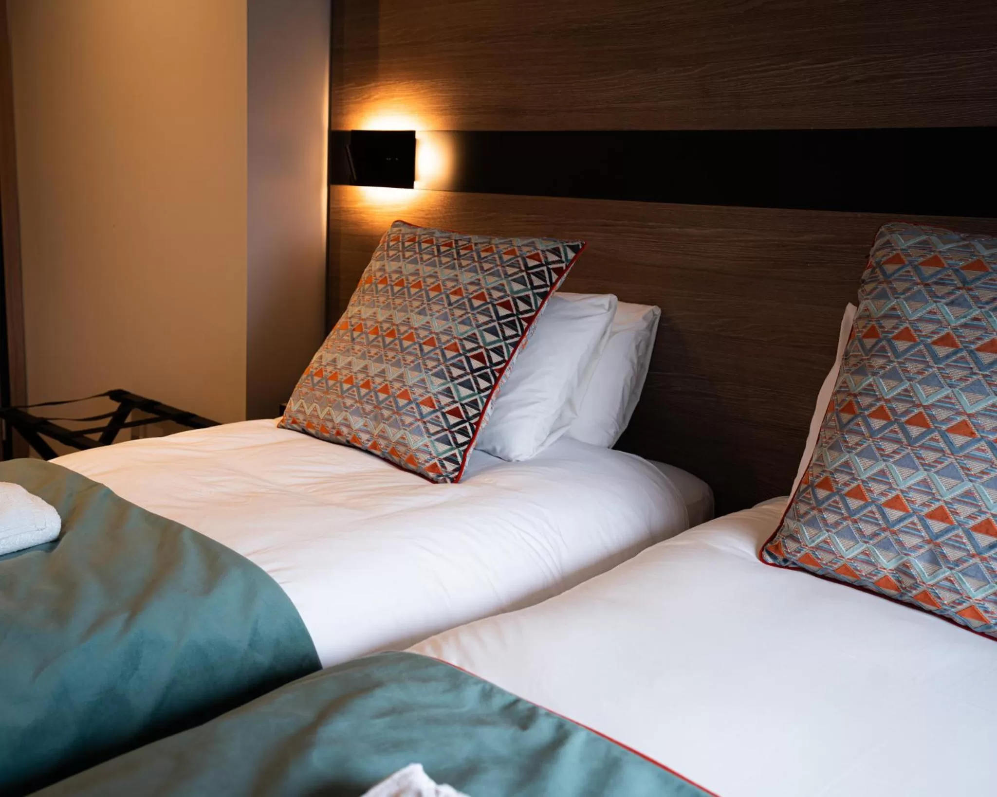 Bed in Merit Kensington Hotel