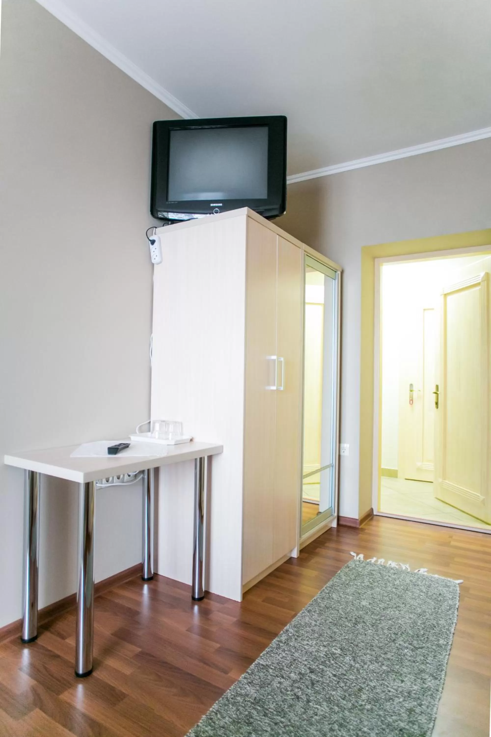 TV/Entertainment Center in Tulipan Hotel Aquapark