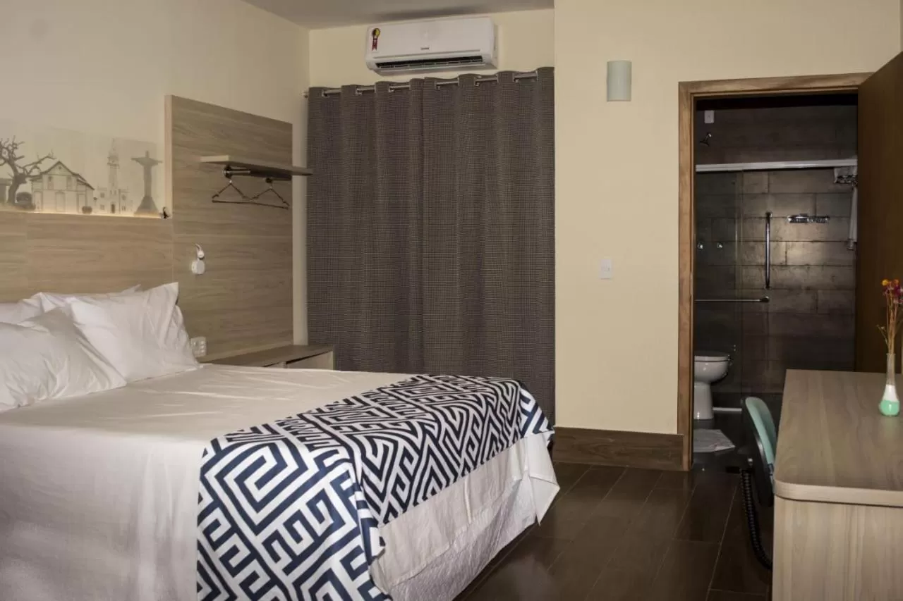 Bed in Pousada Araxá