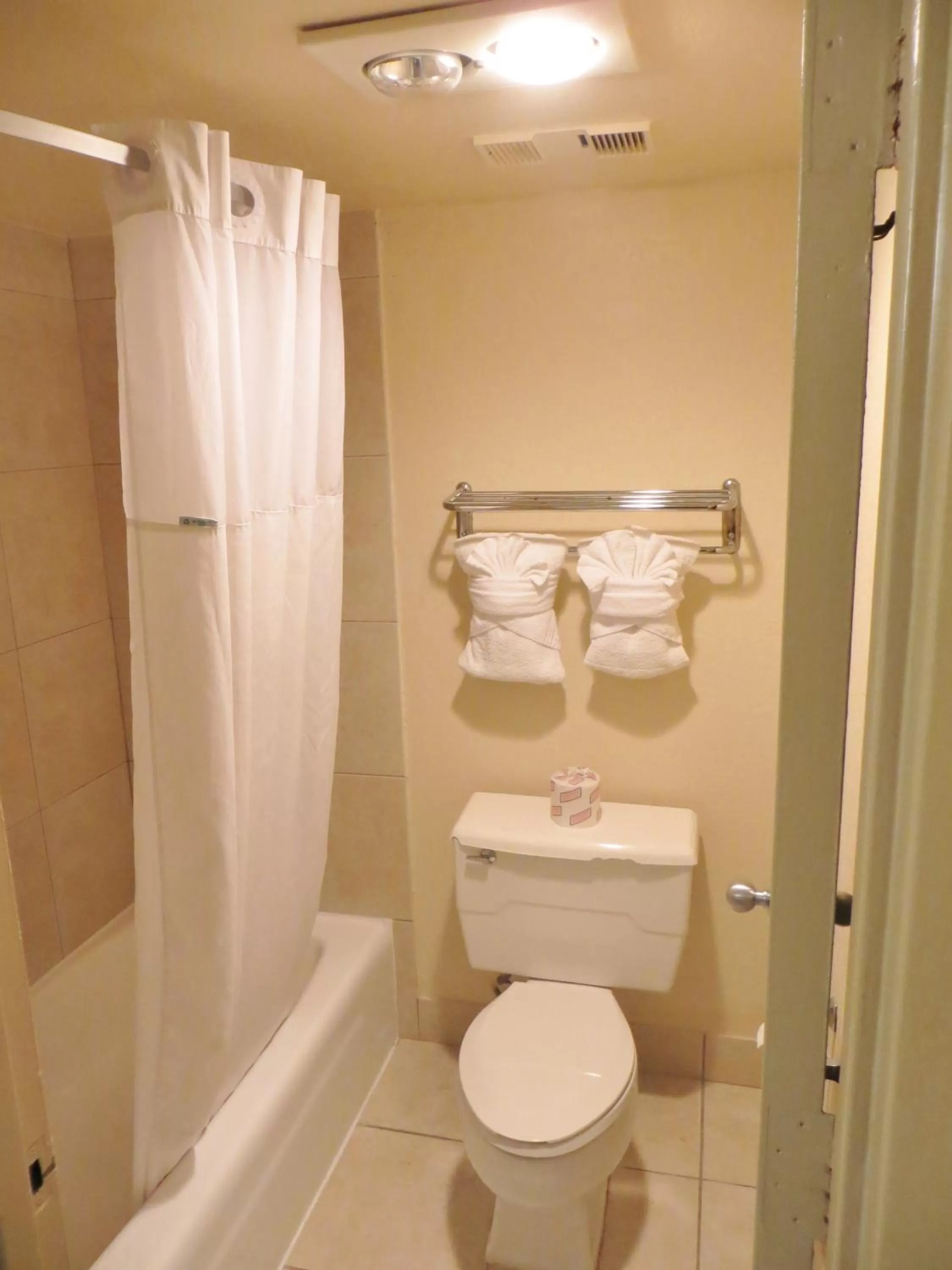 Bathroom in Days Inn by Wyndham Orlando Airport Florida Mall