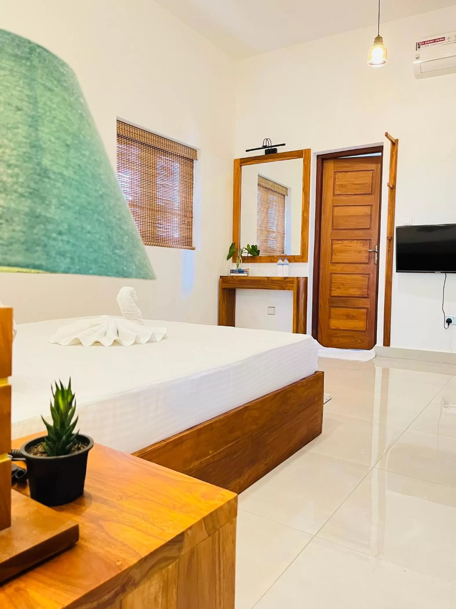 Bed in J leaf Hotel by Blue Bird