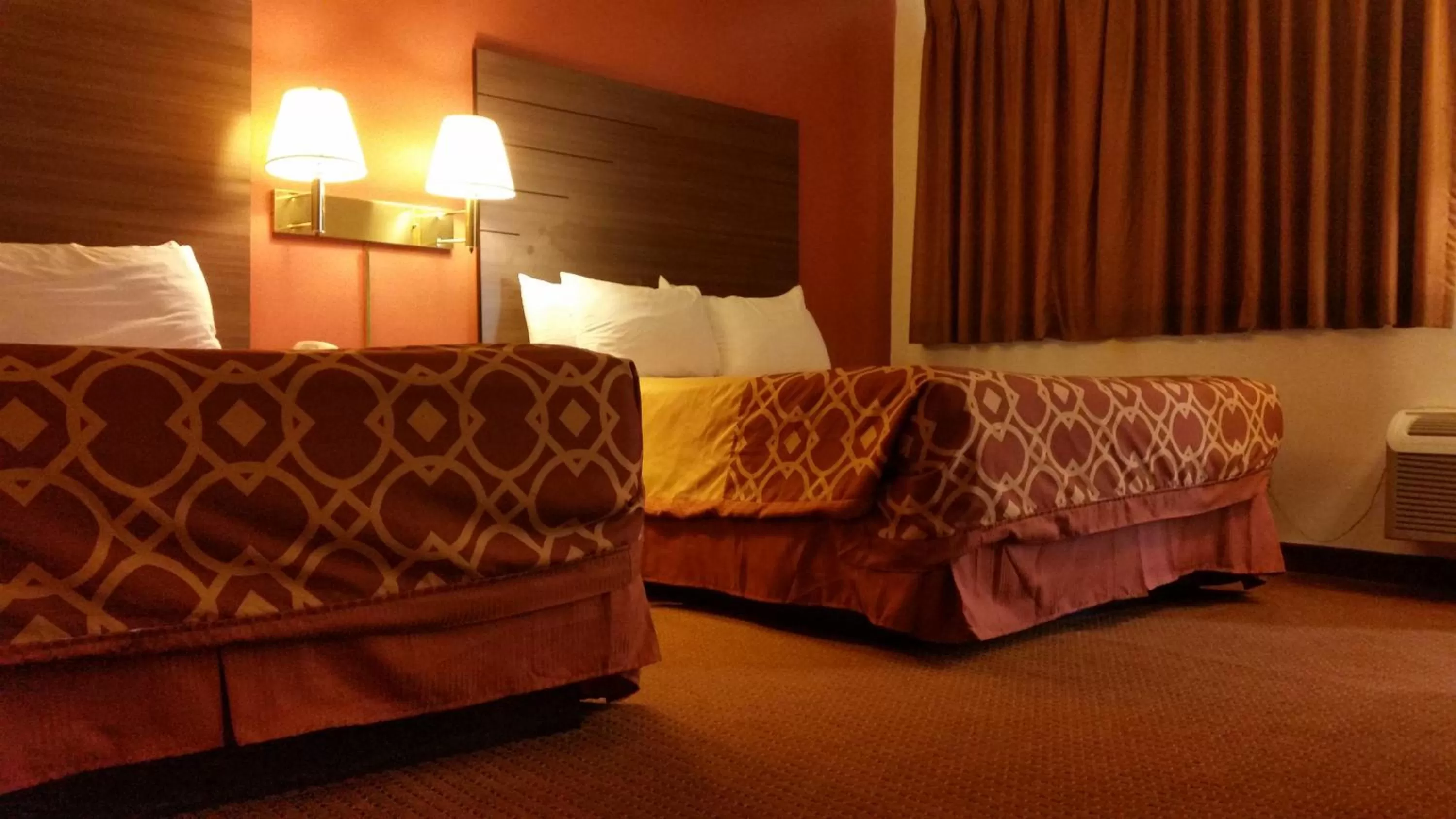 Bed in American Inn Of Liberal