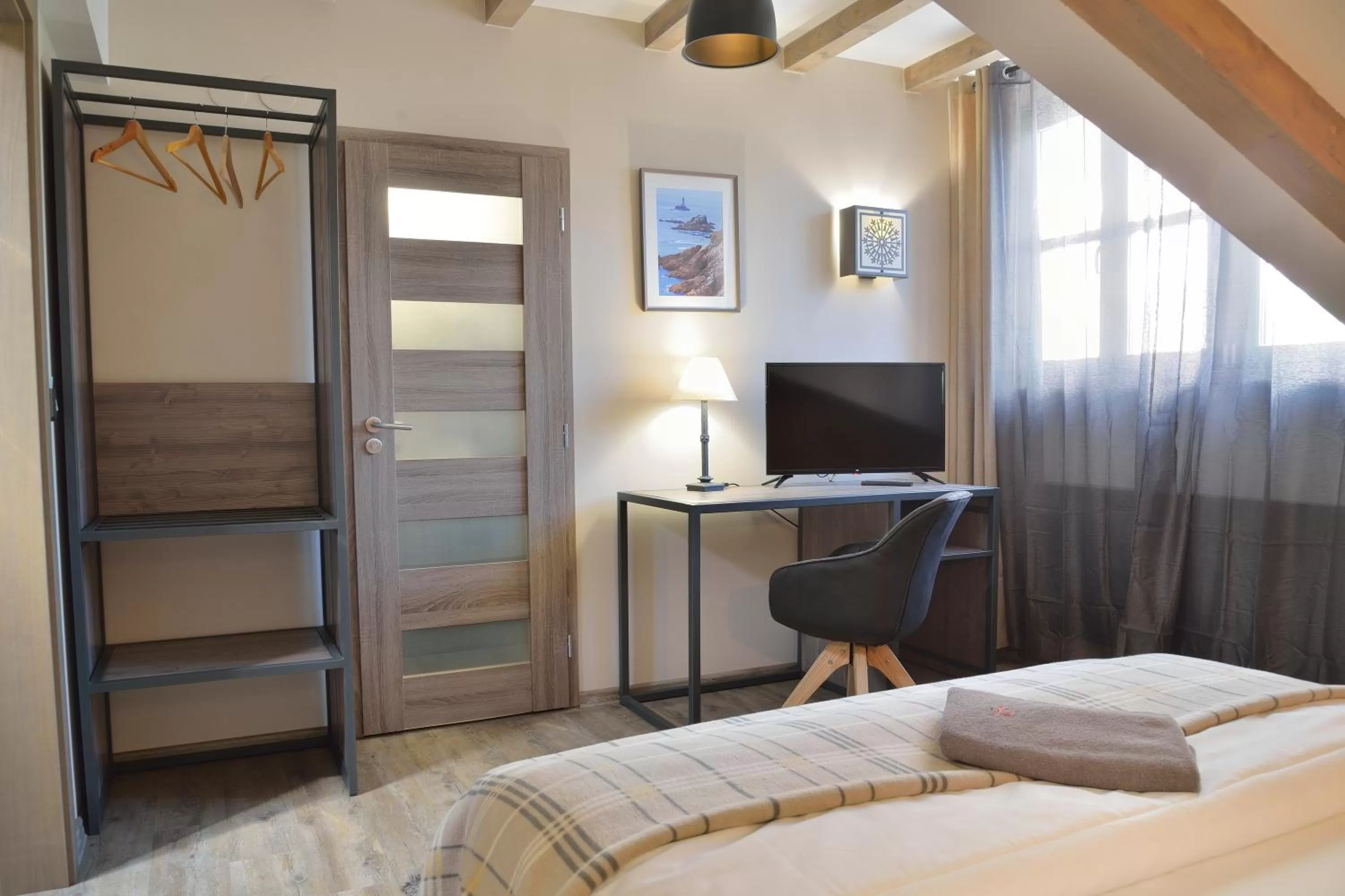 TV/Entertainment Center in Hotel and restaurant Via Ironia