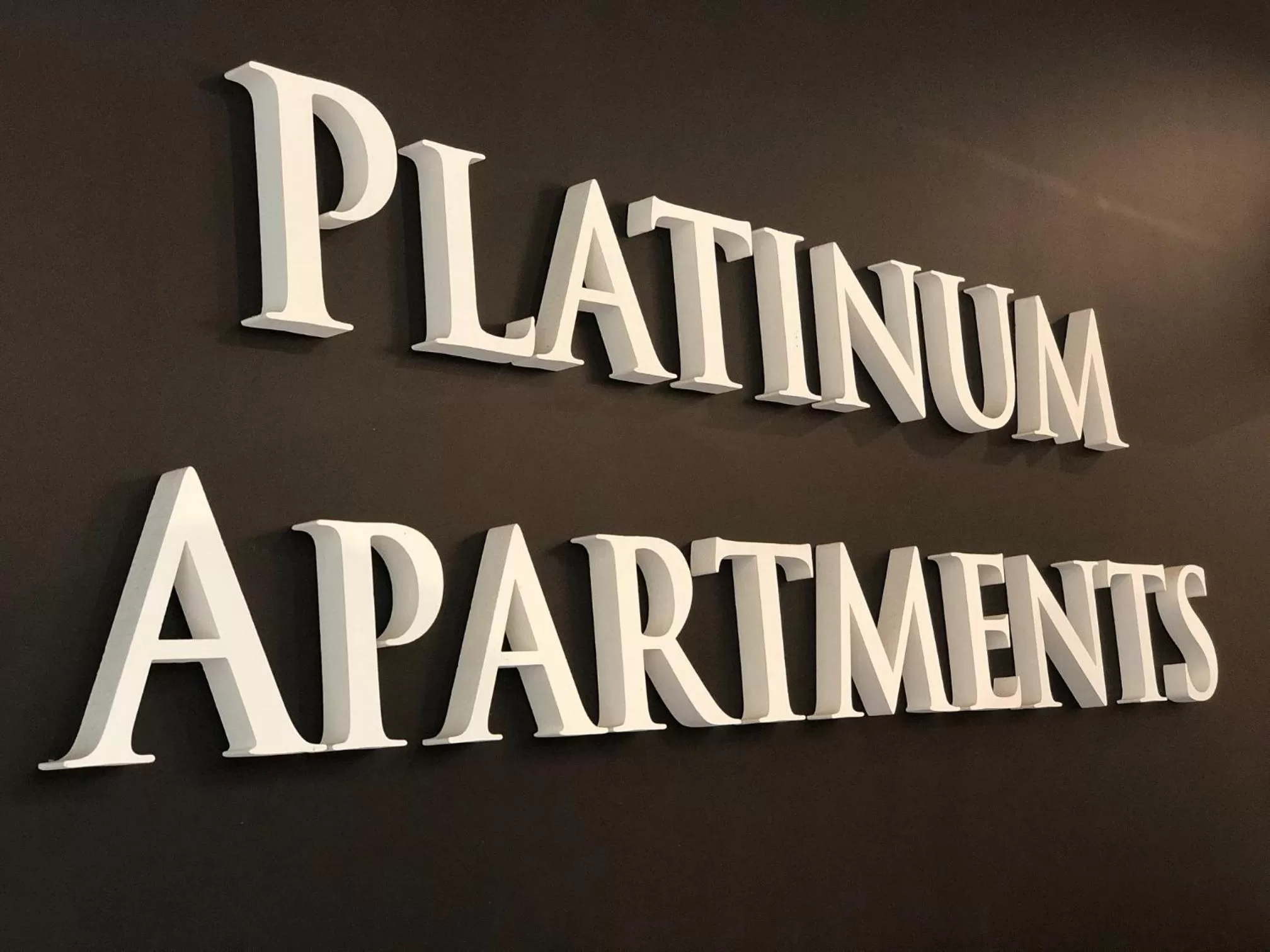 Property logo or sign in Platinum Apartments Aparthotel