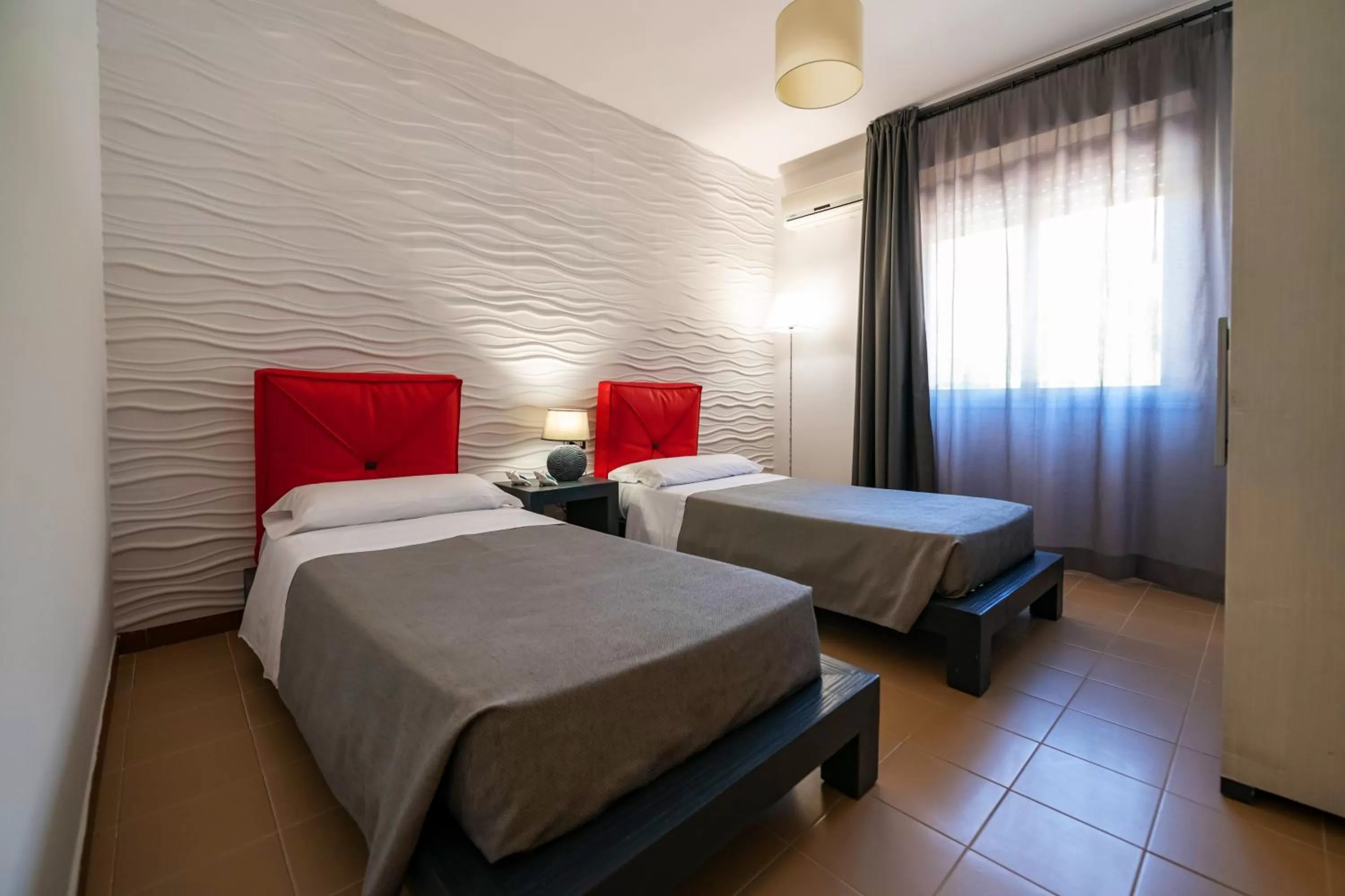 Bed in Aparthotel Isabella