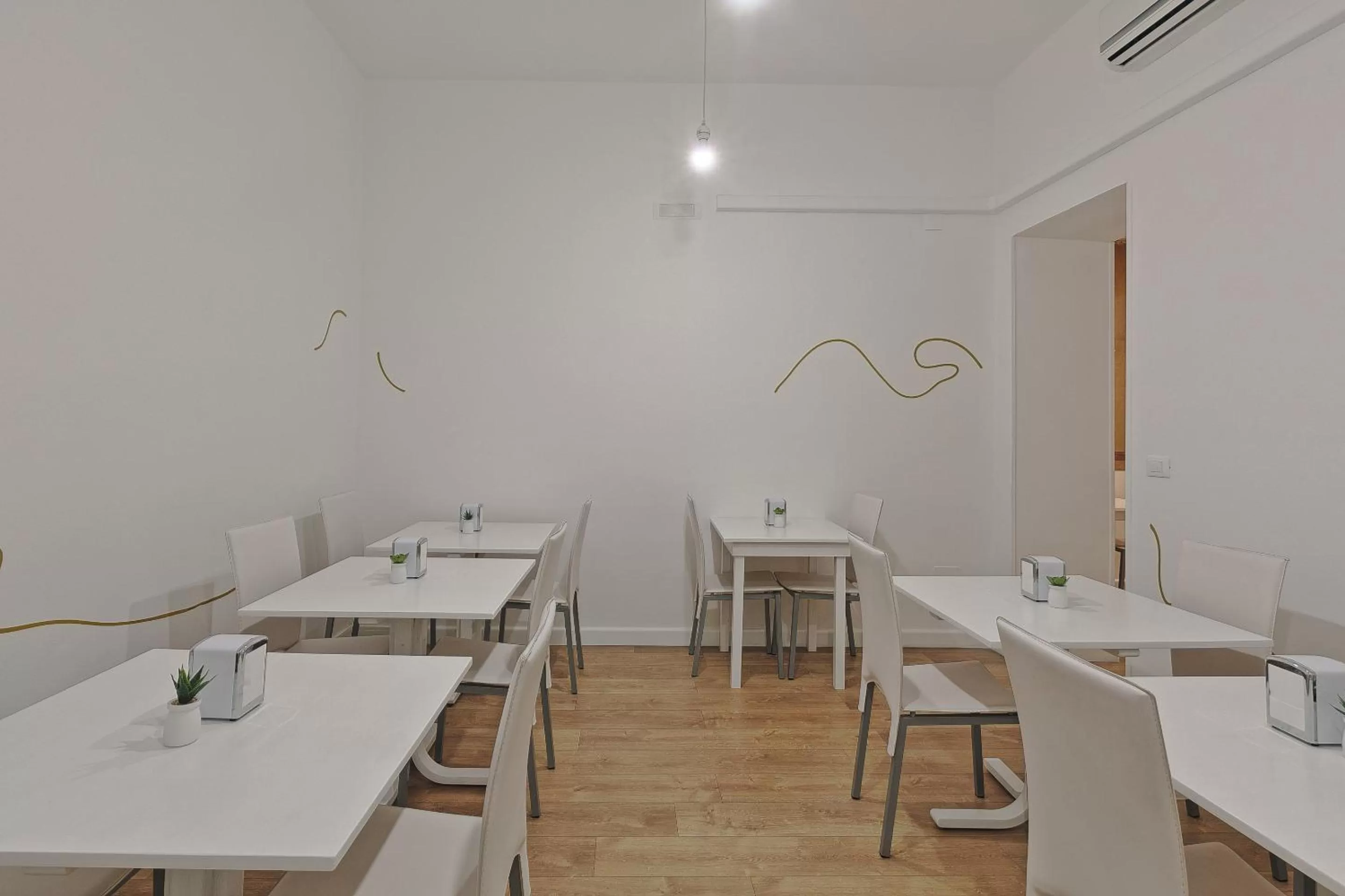 Communal lounge/ TV room in Afea Art & Rooms