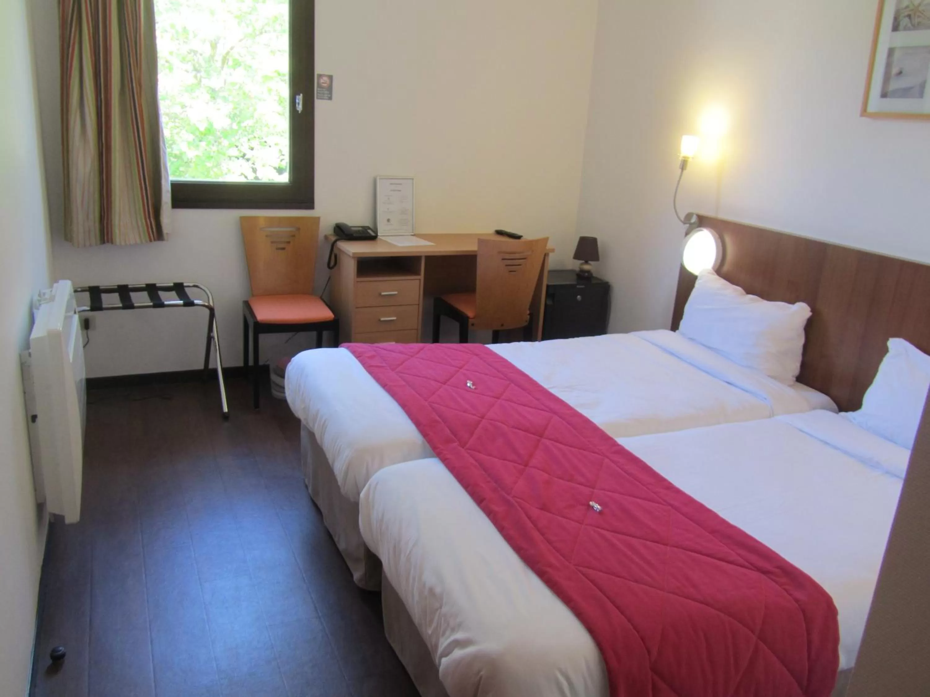 Photo of the whole room, Bed in Hôtel Le Saint Joseph