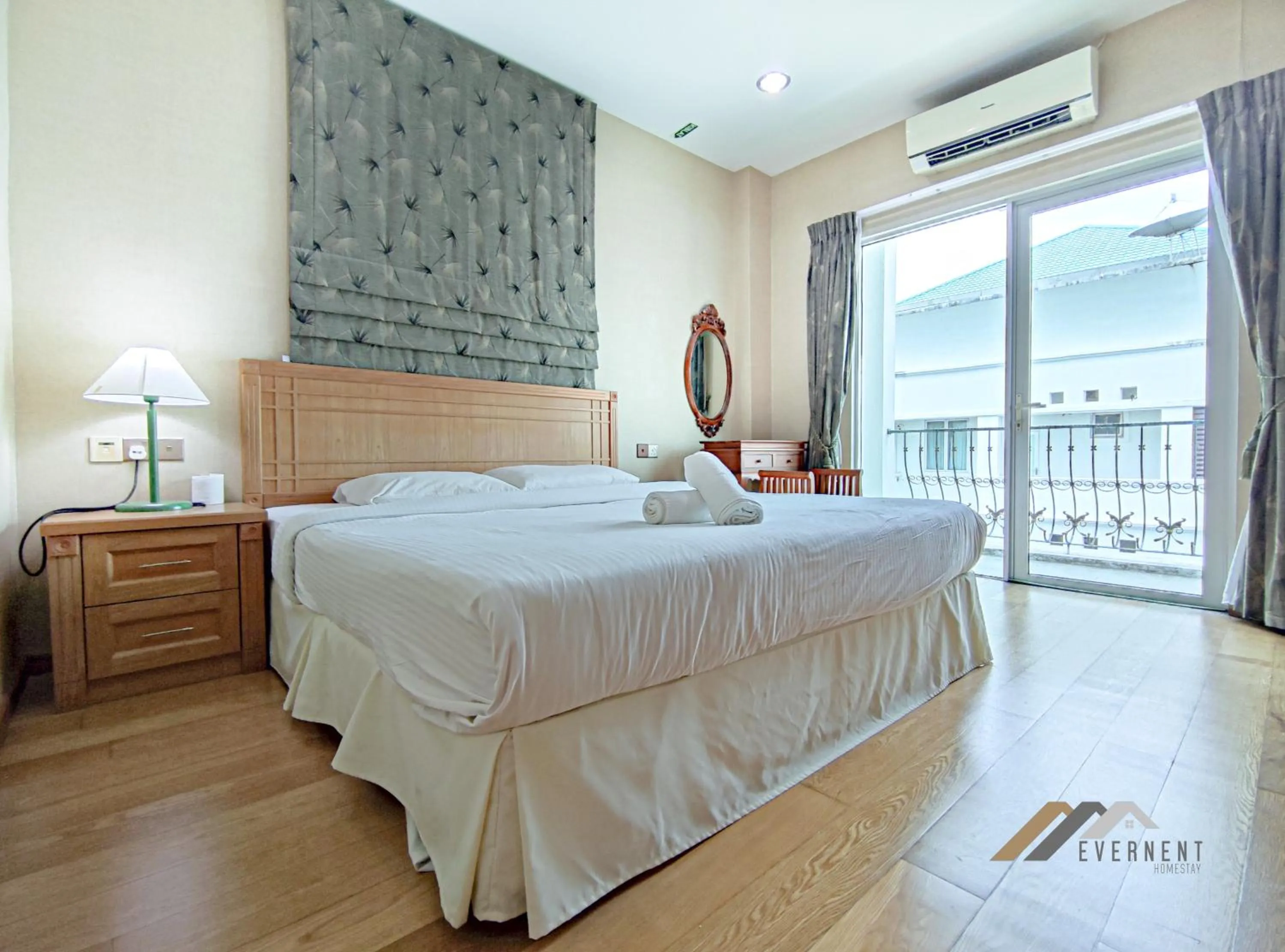 Bed in Mciti Suites by Evernent