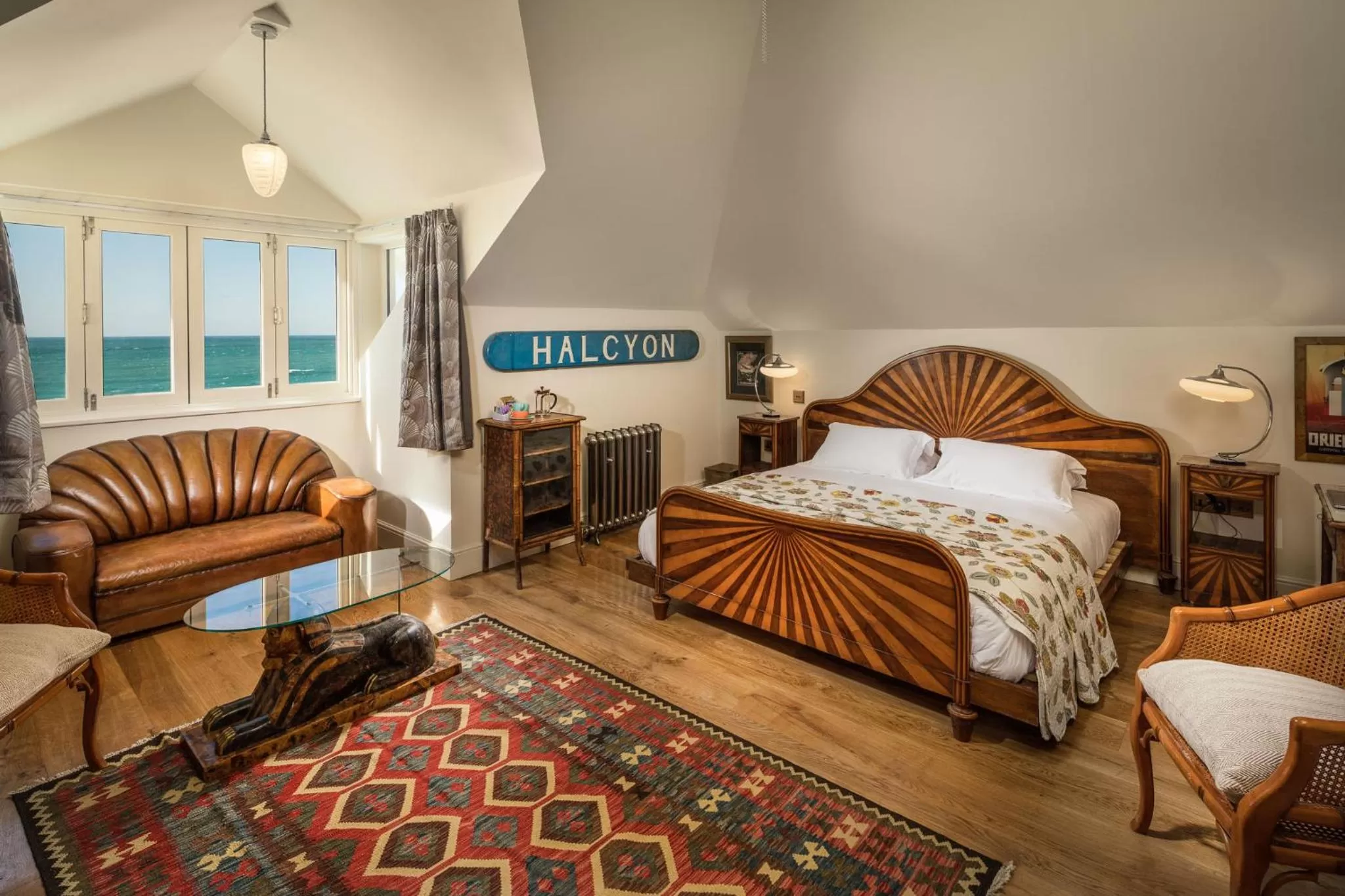 Seating area, Bed in Tolcarne Beach Colonial Restaurant and Rooms