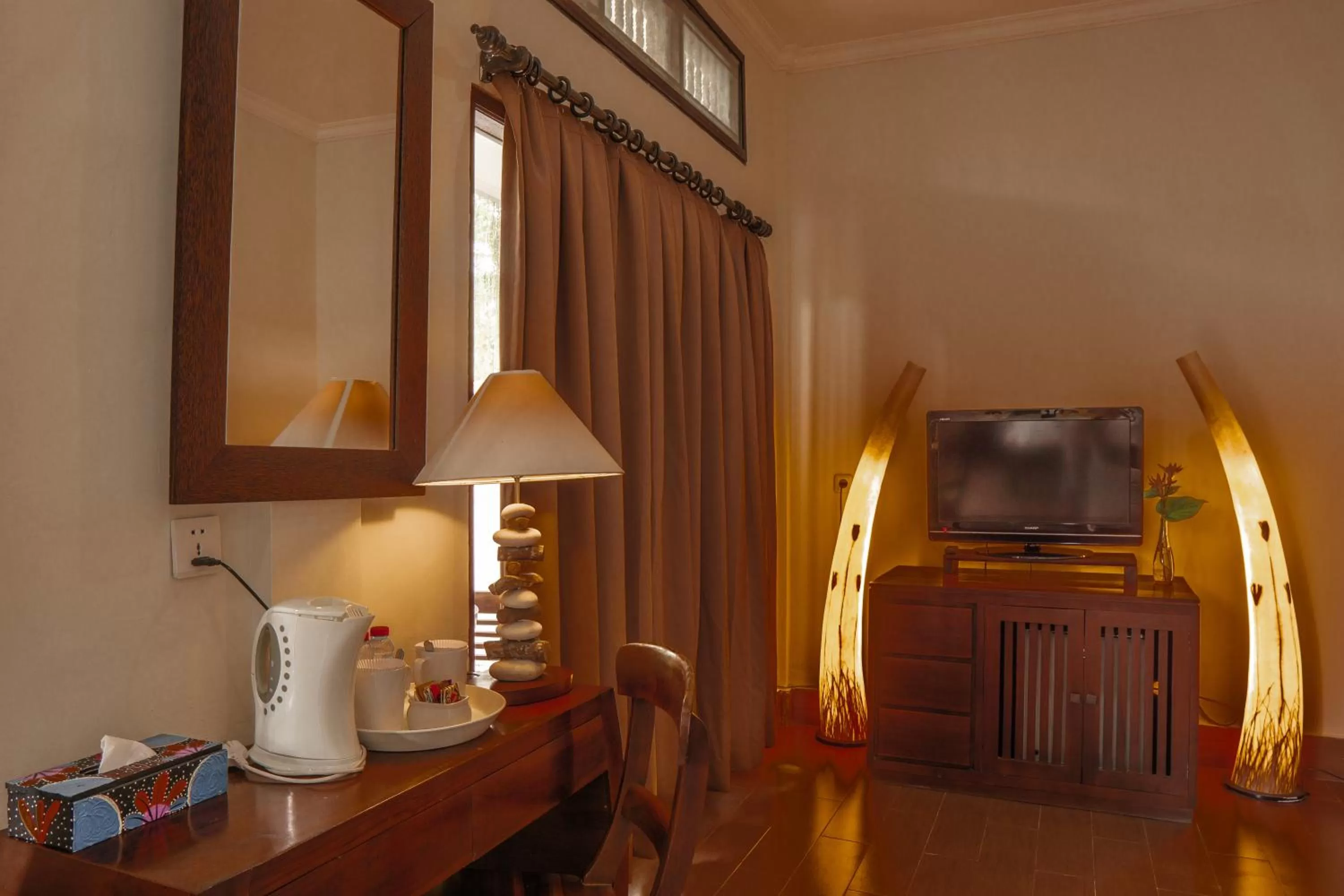 TV and multimedia in Artini Bisma Ubud Hotel