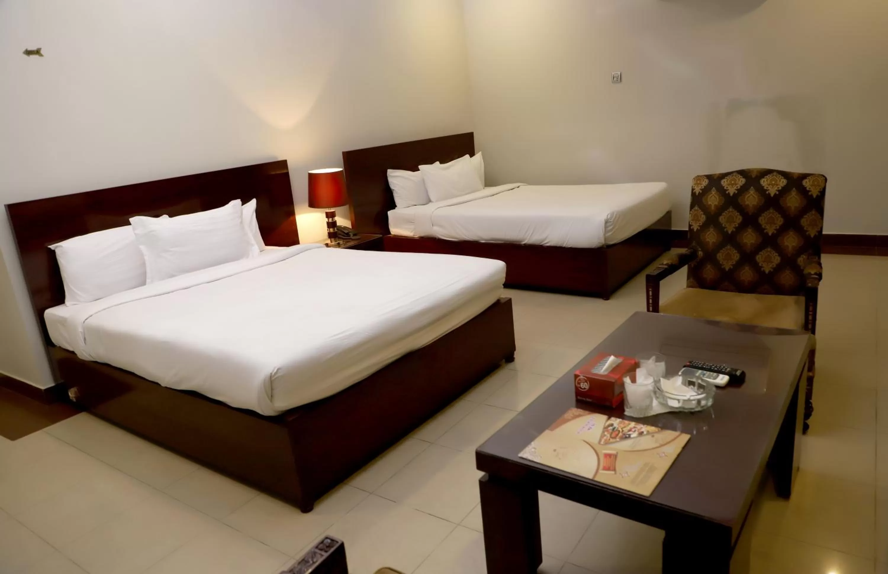 Bed in Hotel Multan Continental