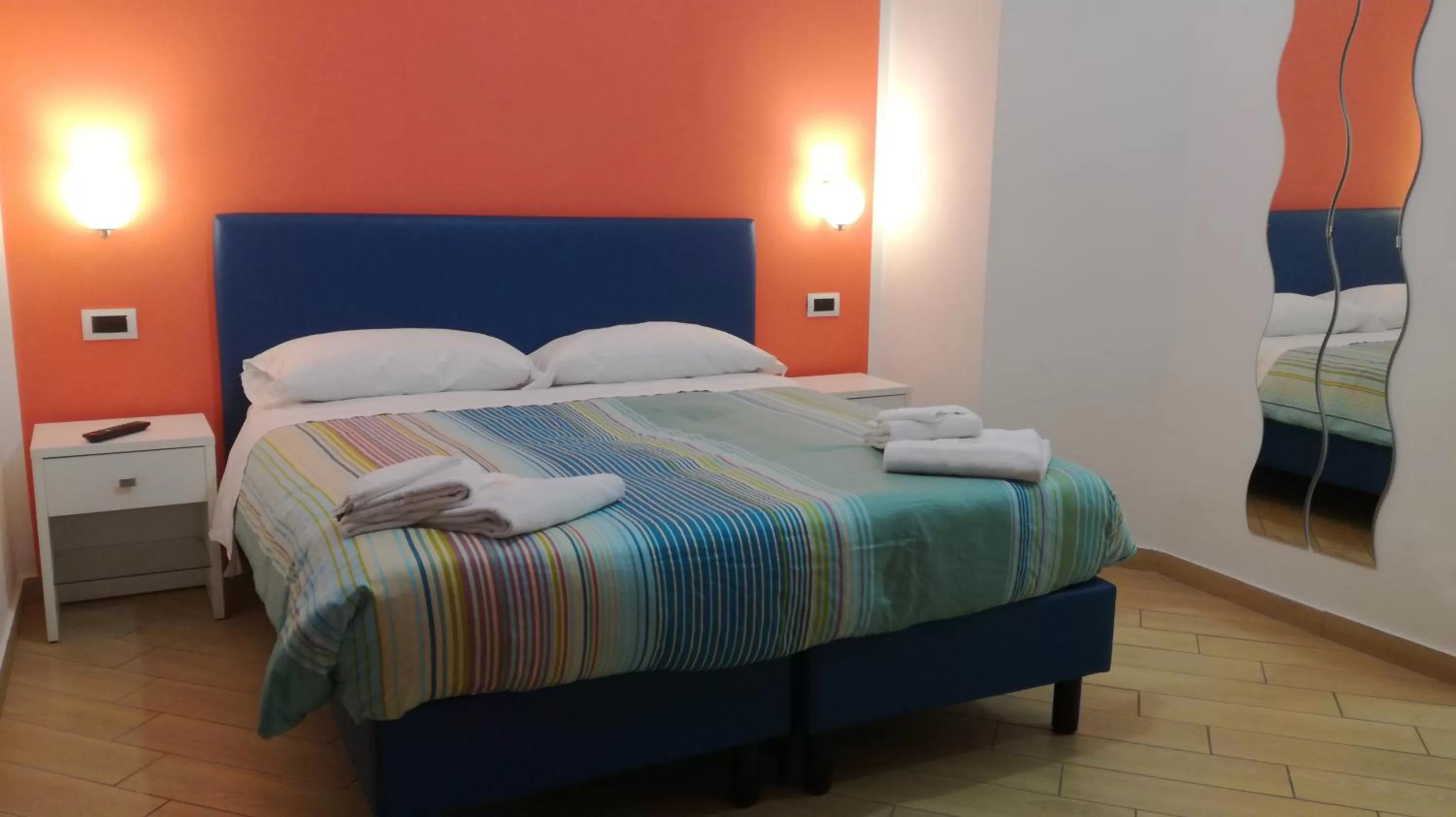 Photo of the whole room, Bed in Bovio Modern Suite