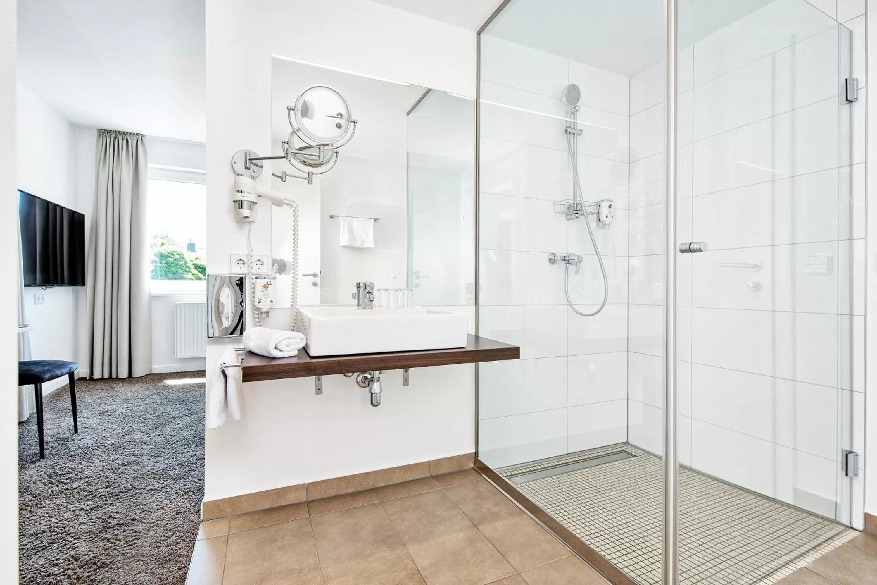 Bathroom in Hotel 24 Checkin Velden