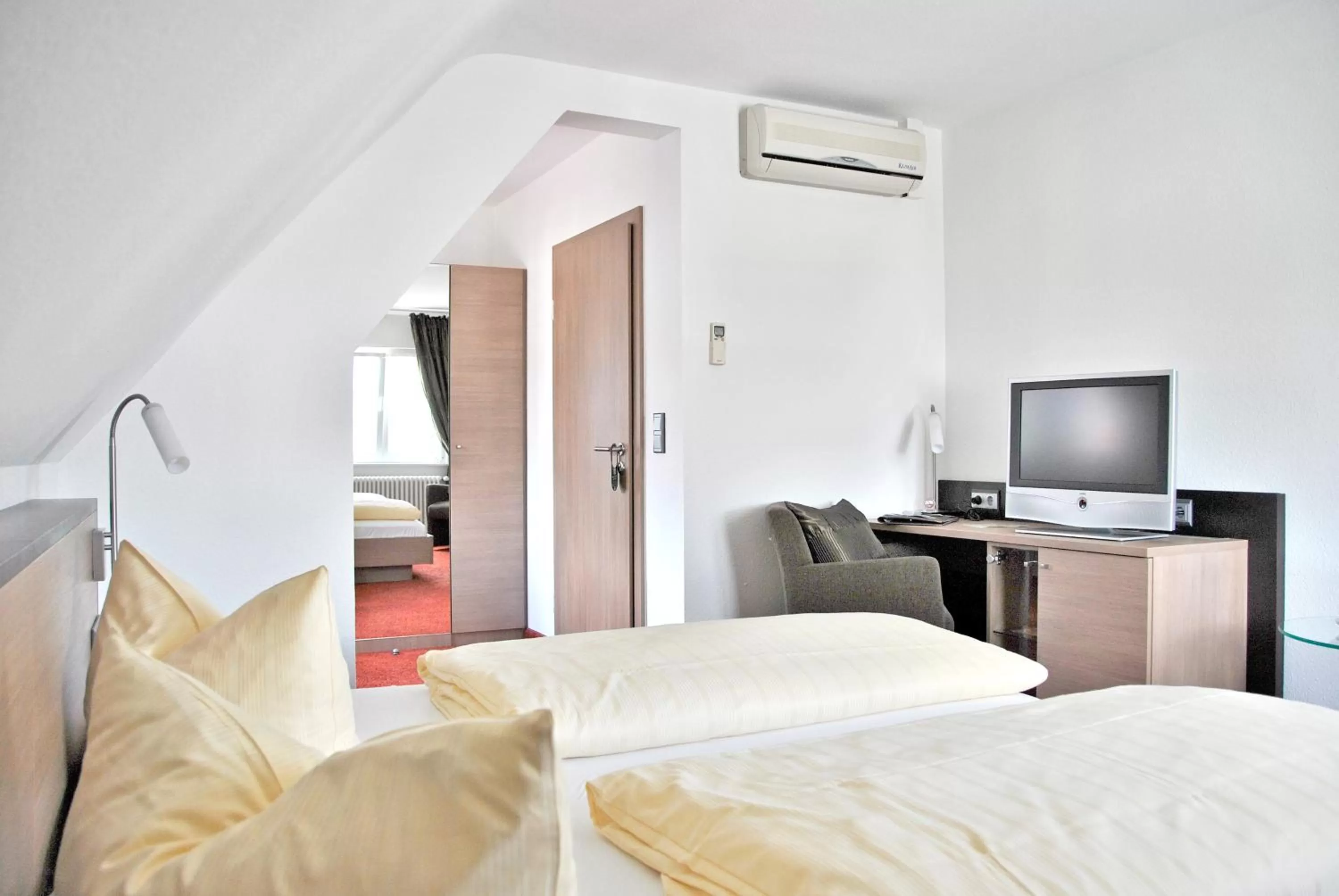 Photo of the whole room, TV/Entertainment Center in Landgasthof Rebstock Weil am Rhein / Basel