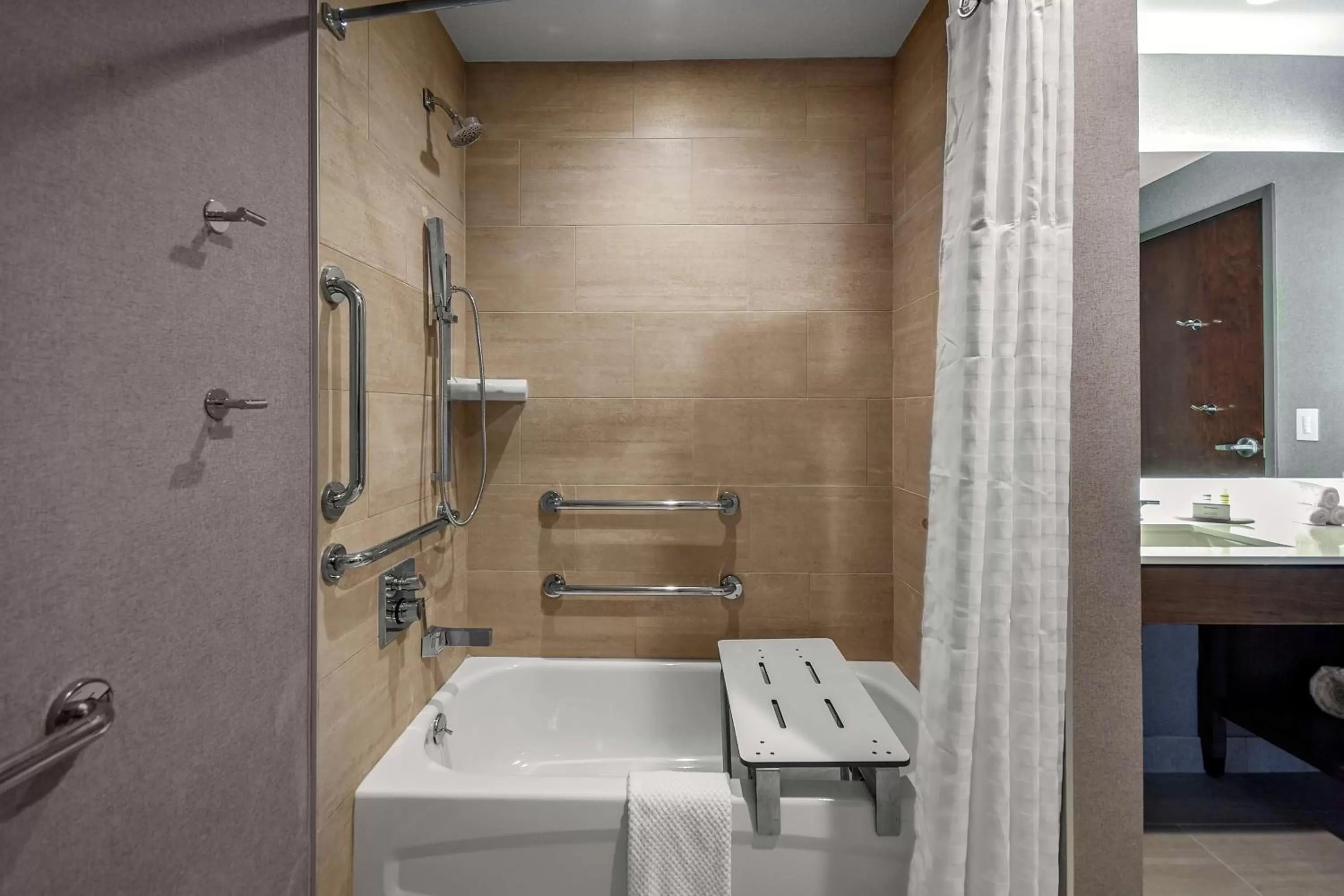 Bathroom in Embassy Suites by Hilton Jonesboro Red Wolf Convention Center