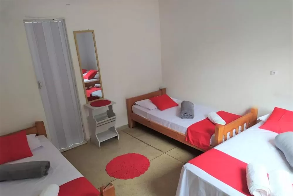 Bed in Pousada Aquarela Pirenopolis