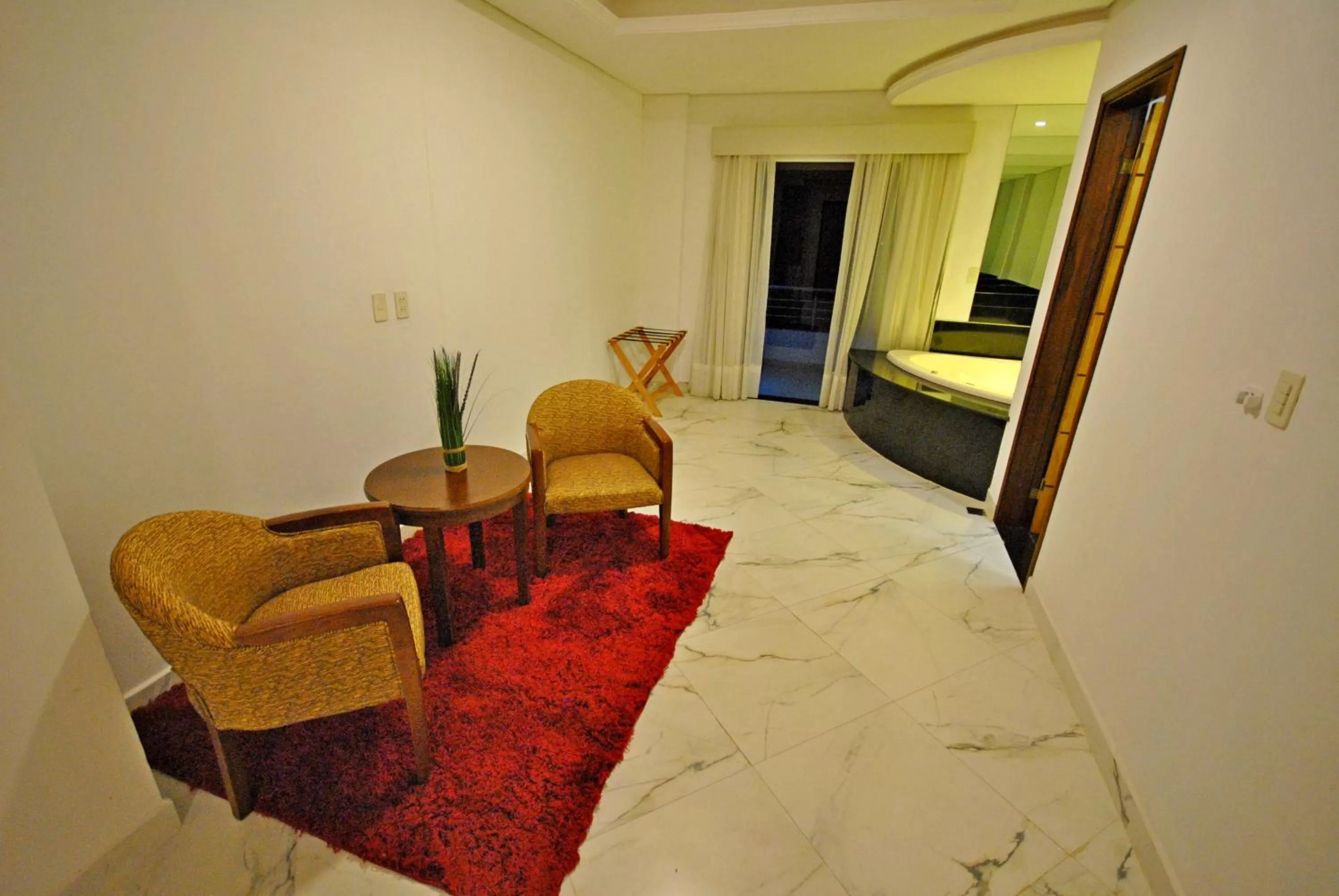 Seating area, Bed in Los Lagos Resort Hotel