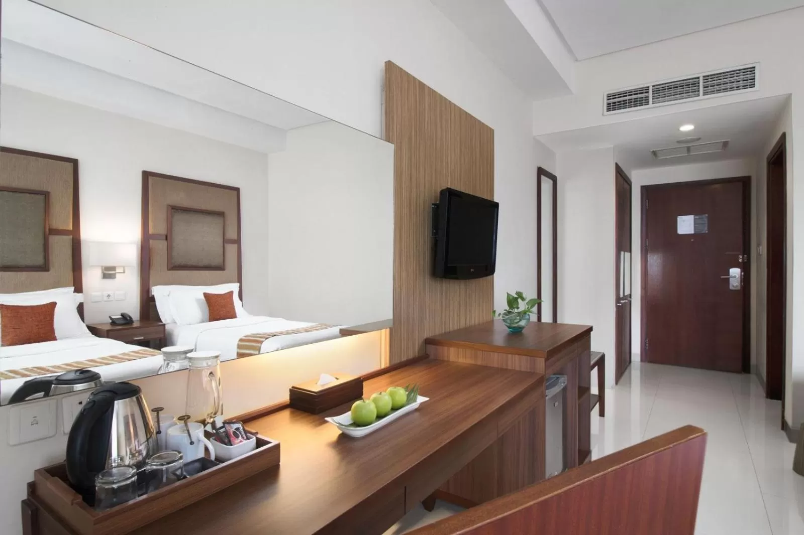 TV and multimedia, Bed in Aston Manado Hotel