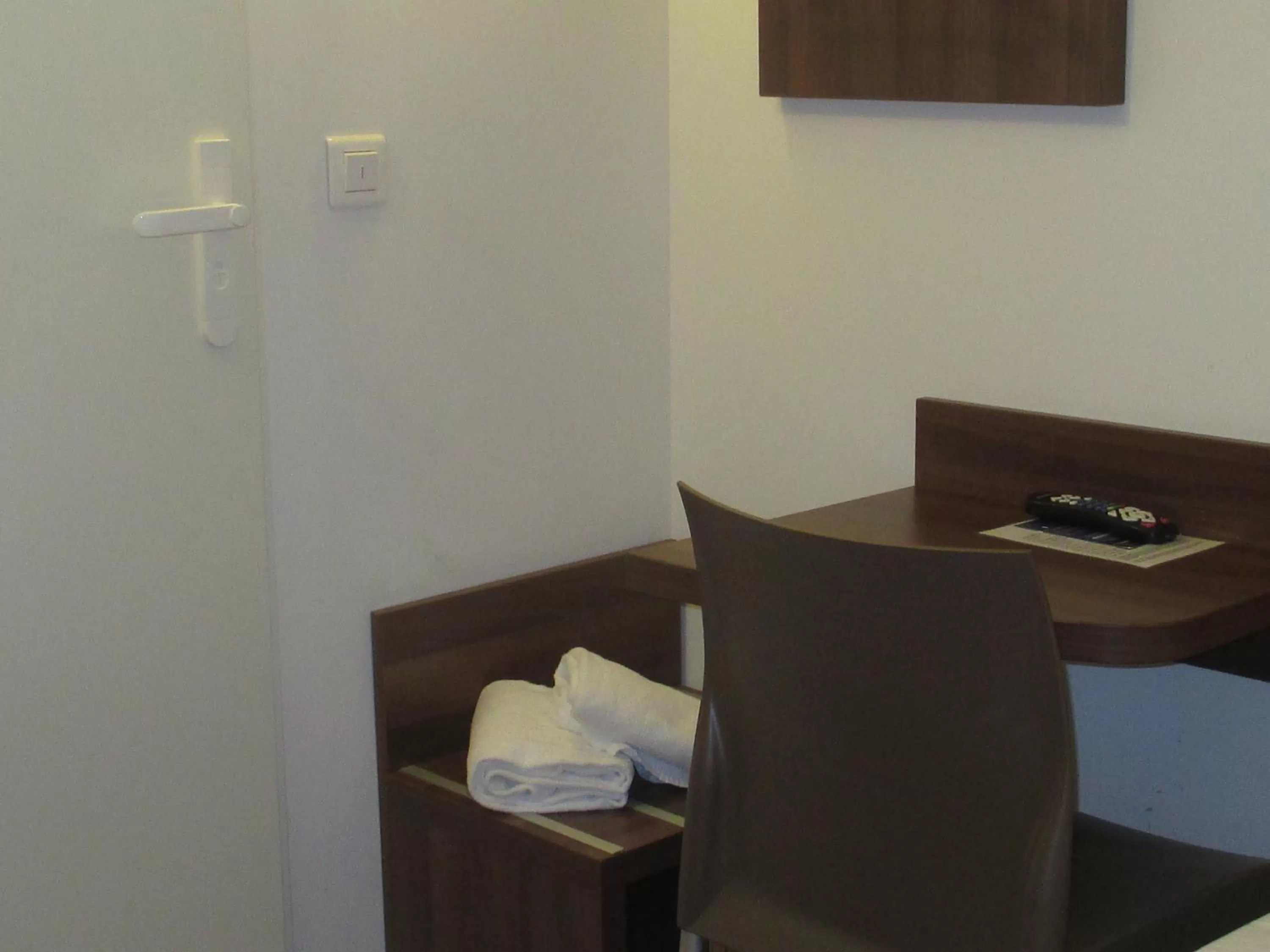 Bedroom in Hôtel le Pastel