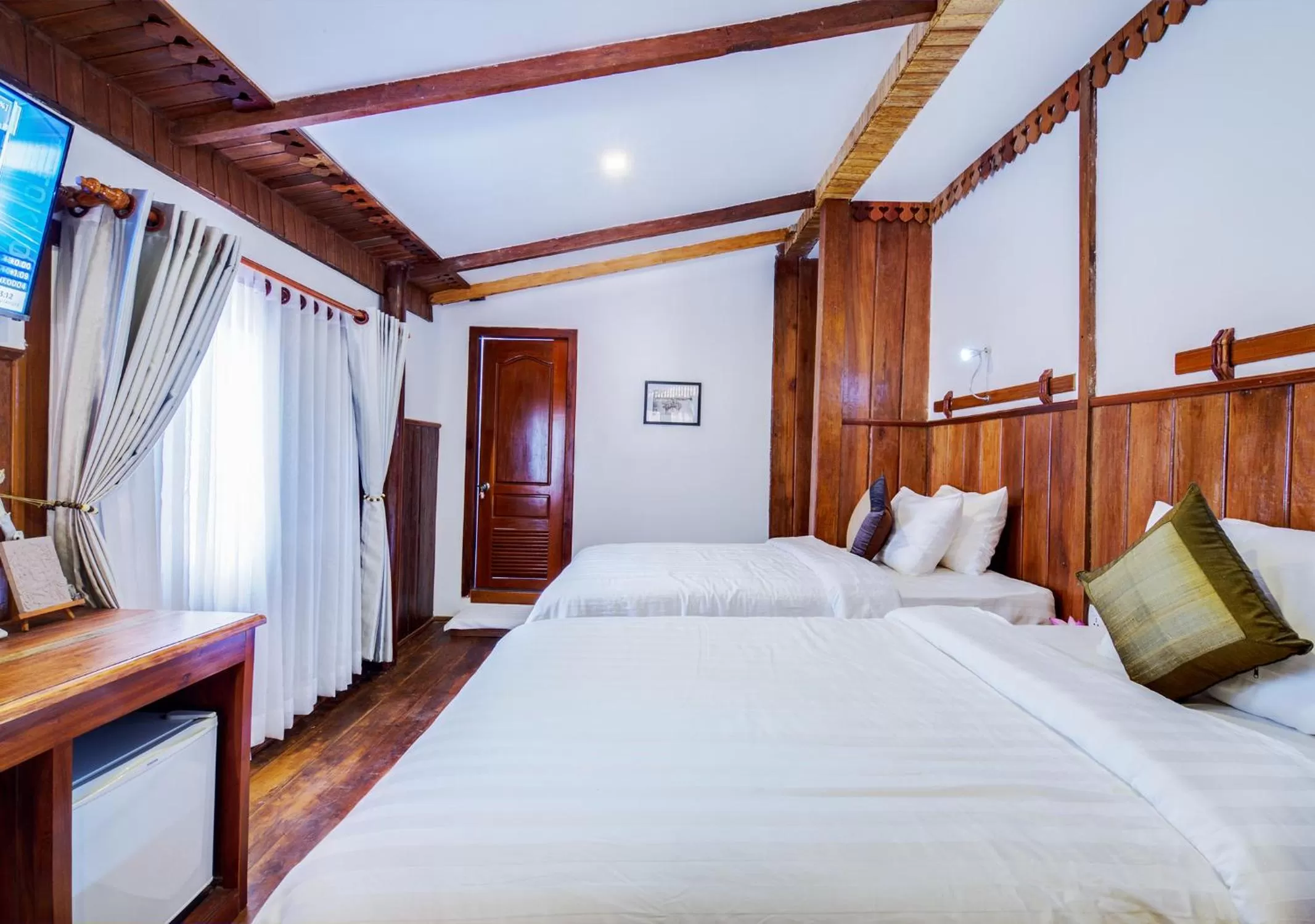 Bed in Maison Model d'Angkor