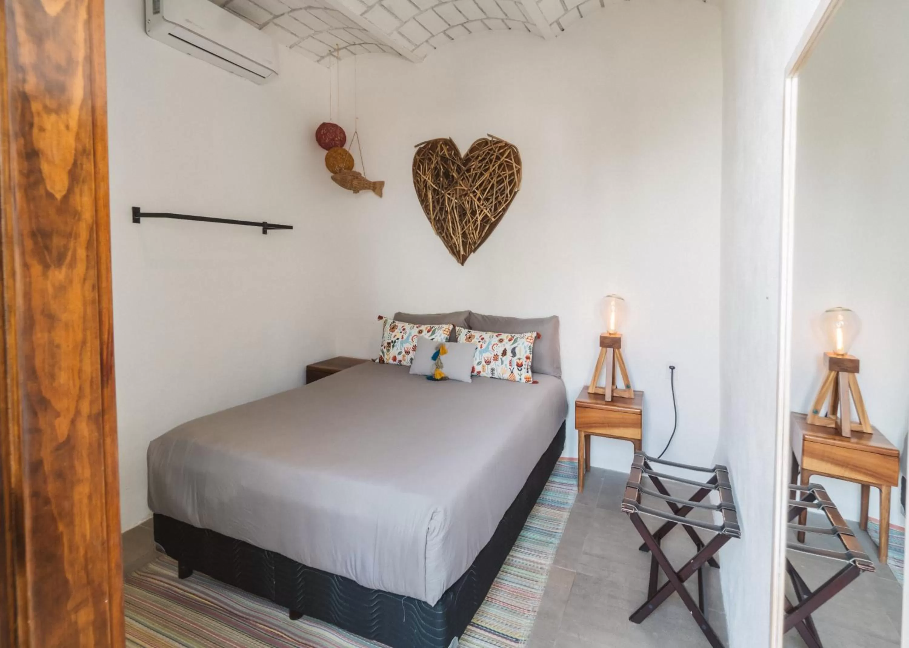 Bed in Amaia Boutique Hotel