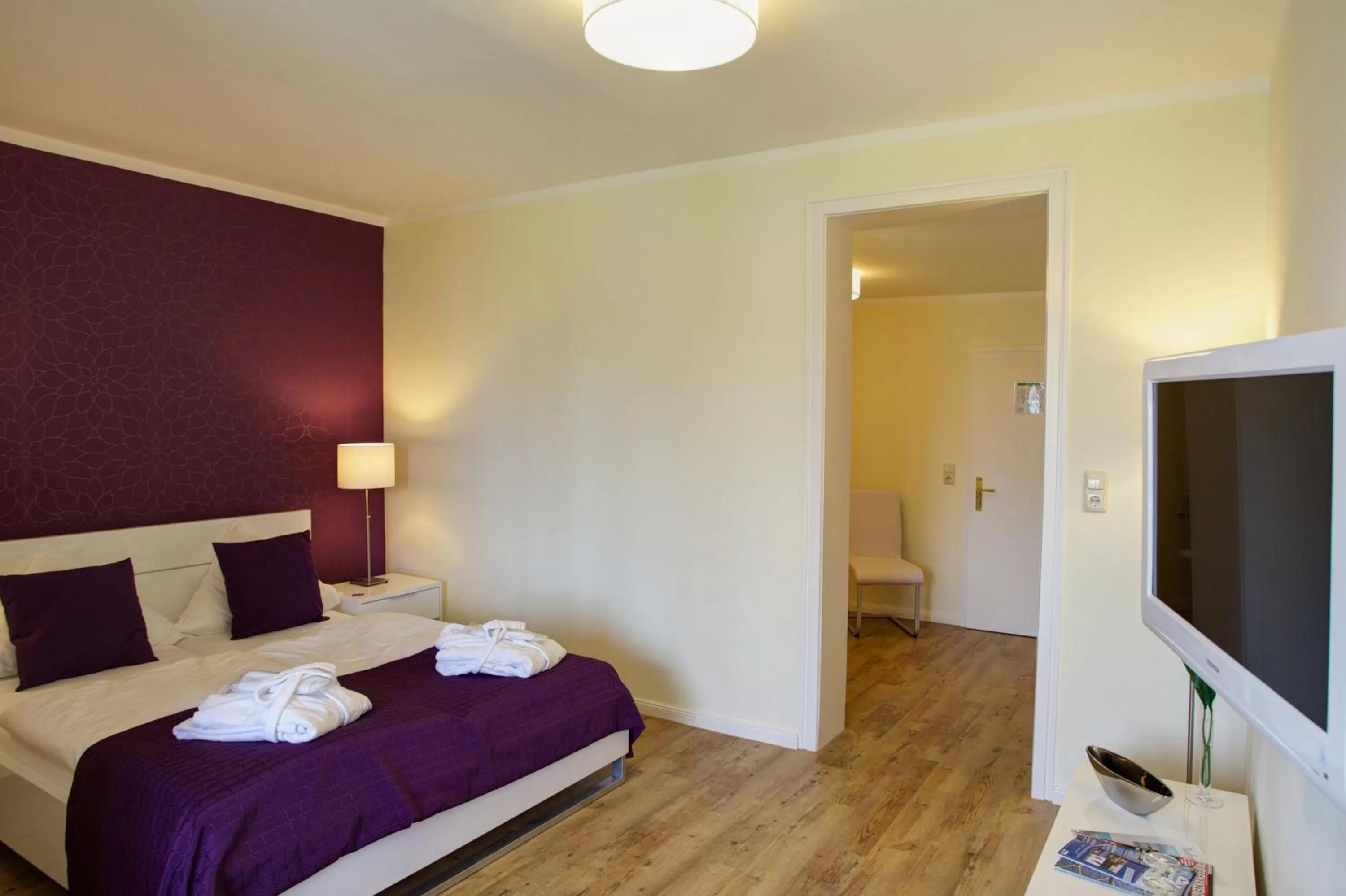 Photo of the whole room, Bed in Das Frühstückshotel Sankt Peter-Ording