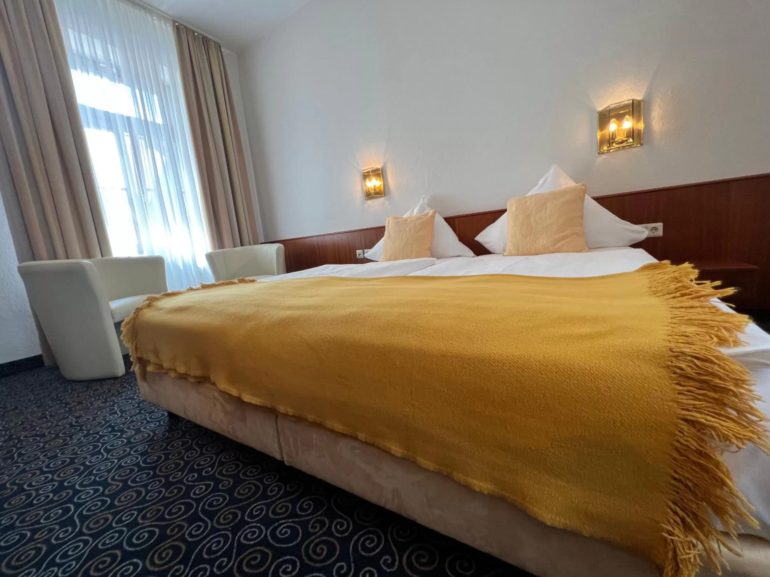 Photo of the whole room in Stadthotel