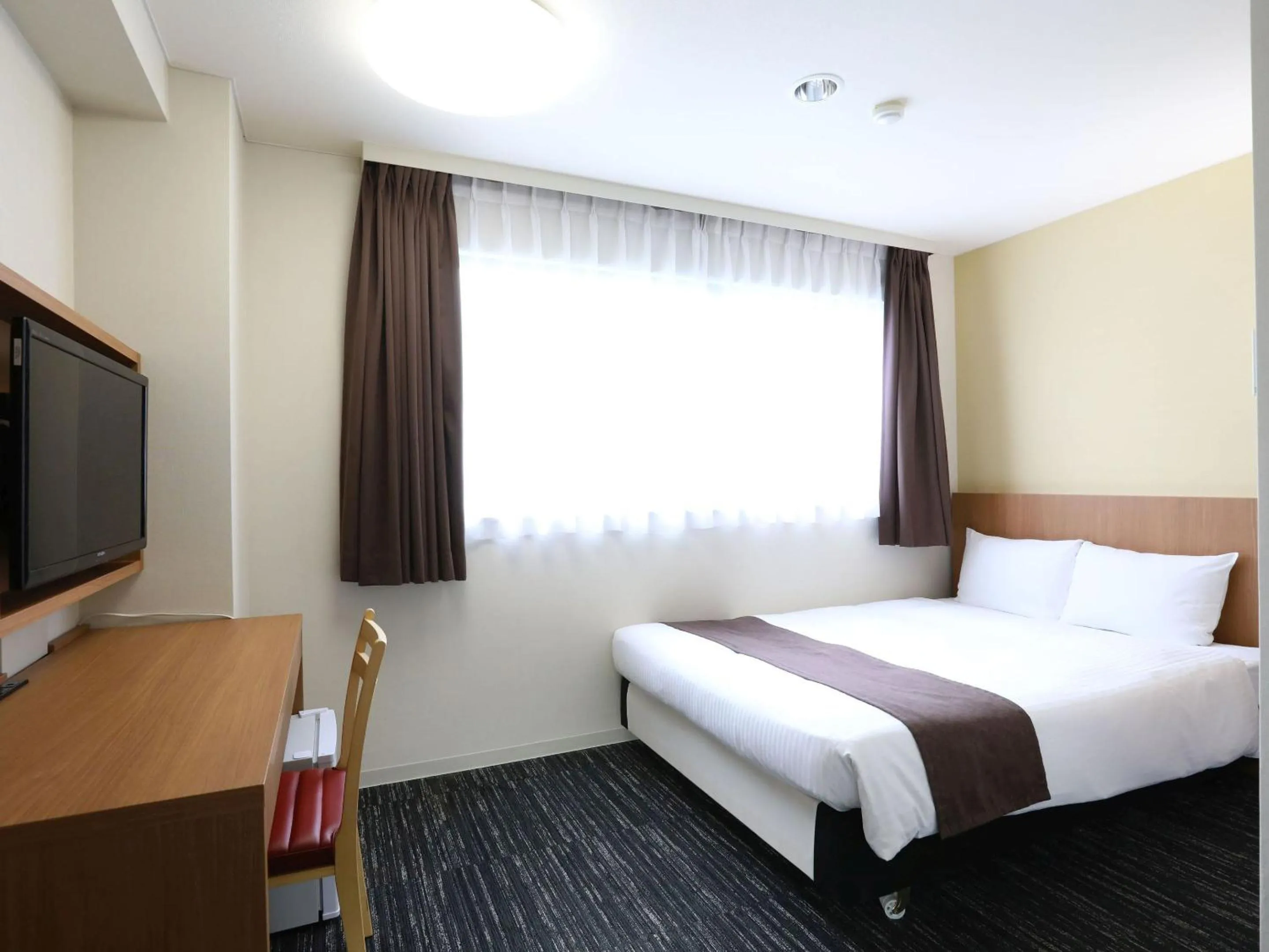 Photo of the whole room, Bed in Hotel Wing International Korakuen