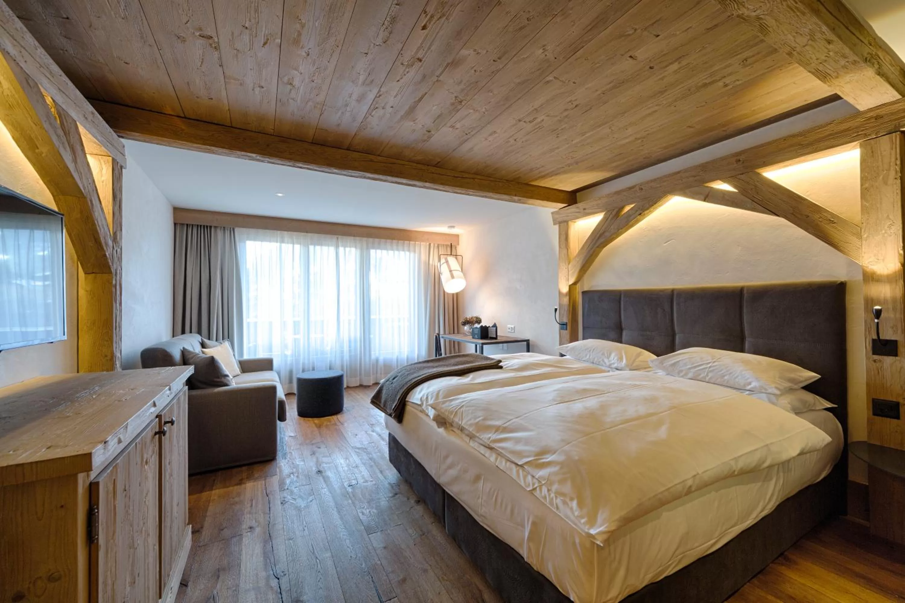 Photo of the whole room, Bed in Bernerhof Swiss Quality Hotel Gstaad