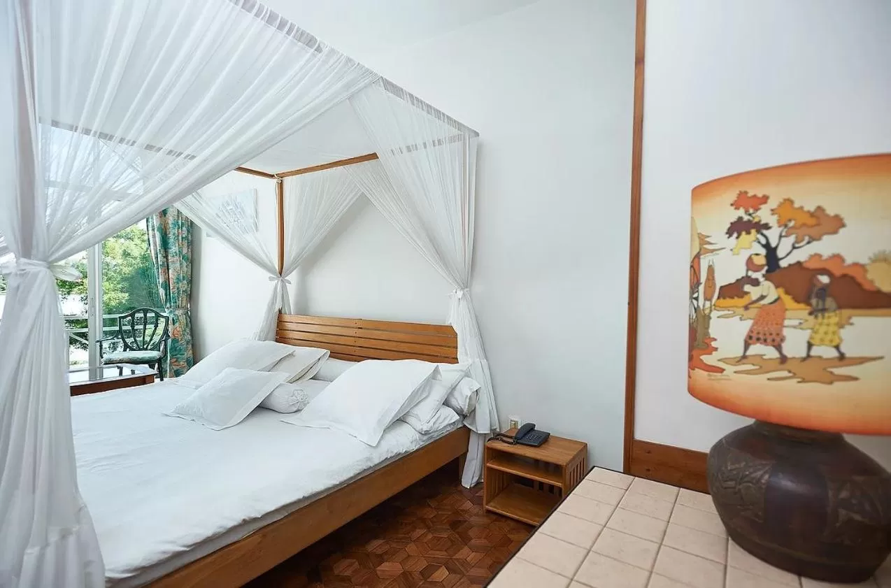 Bedroom, Bed in Riviera Garden Hotel Ivato Airport