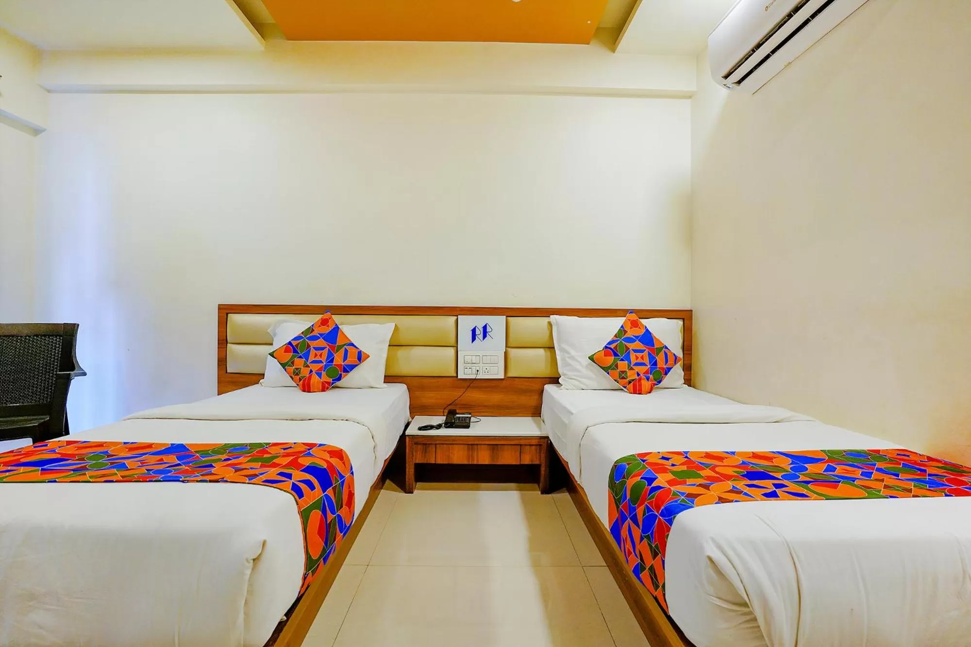 Bed in FabHotel Ramjis Residency