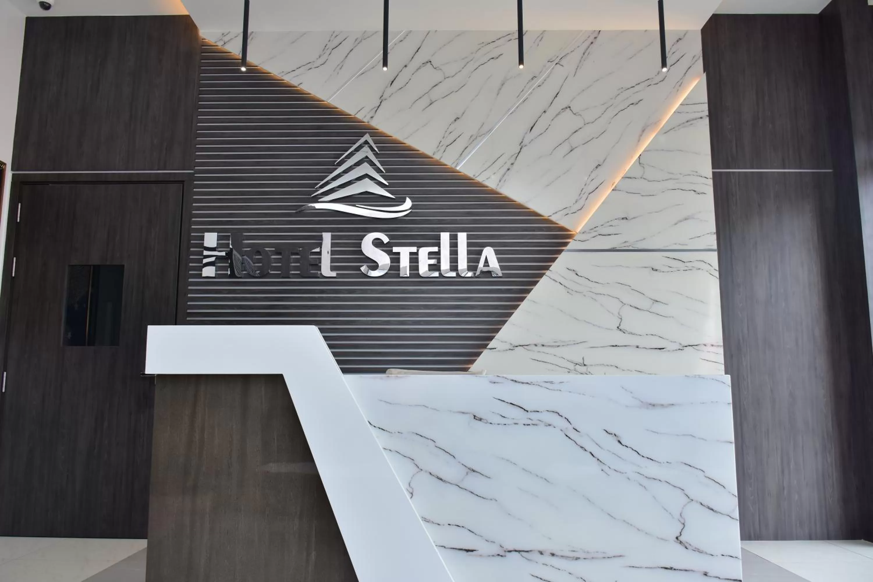 Property logo or sign in Hotel Stella