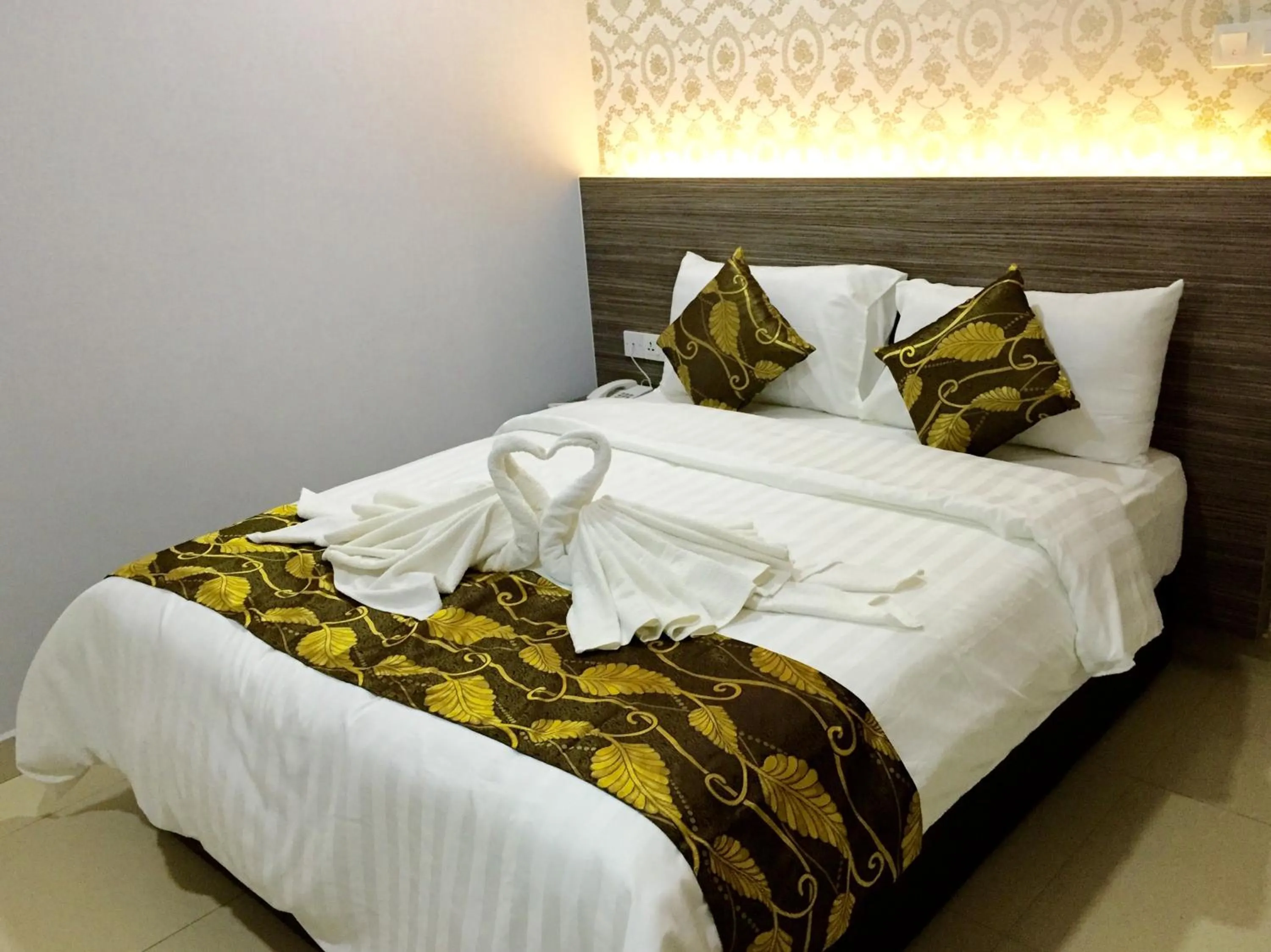 Bed in D'Metro Hotel