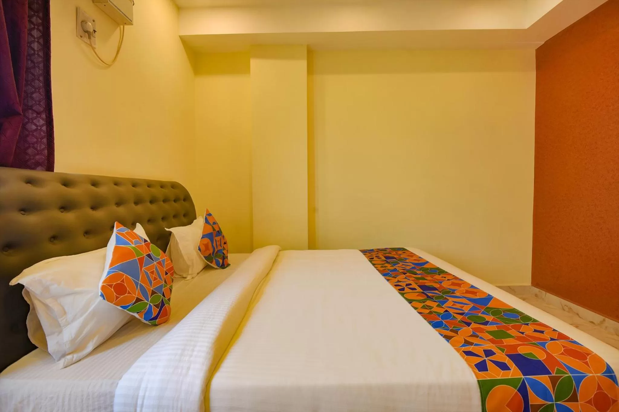 Bed in FabHotel The Fortune Inn