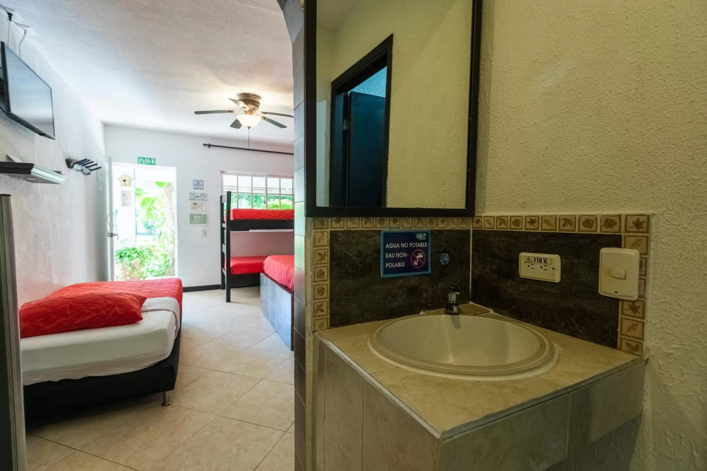 Bathroom, Bed in Hosteria Mar y Sol