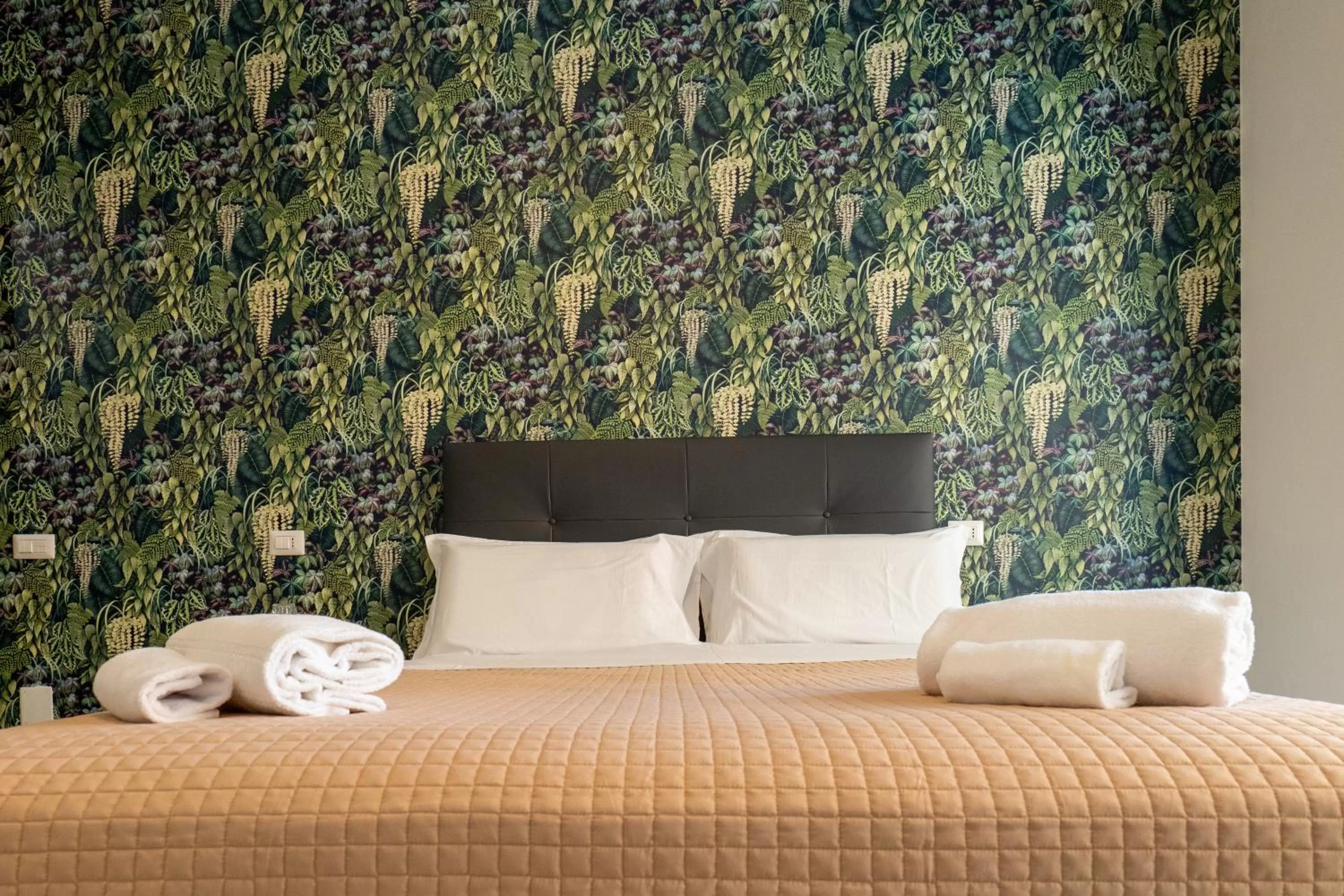 Bed in Relais Vittorio Veneto - Luxotel & Apartotel