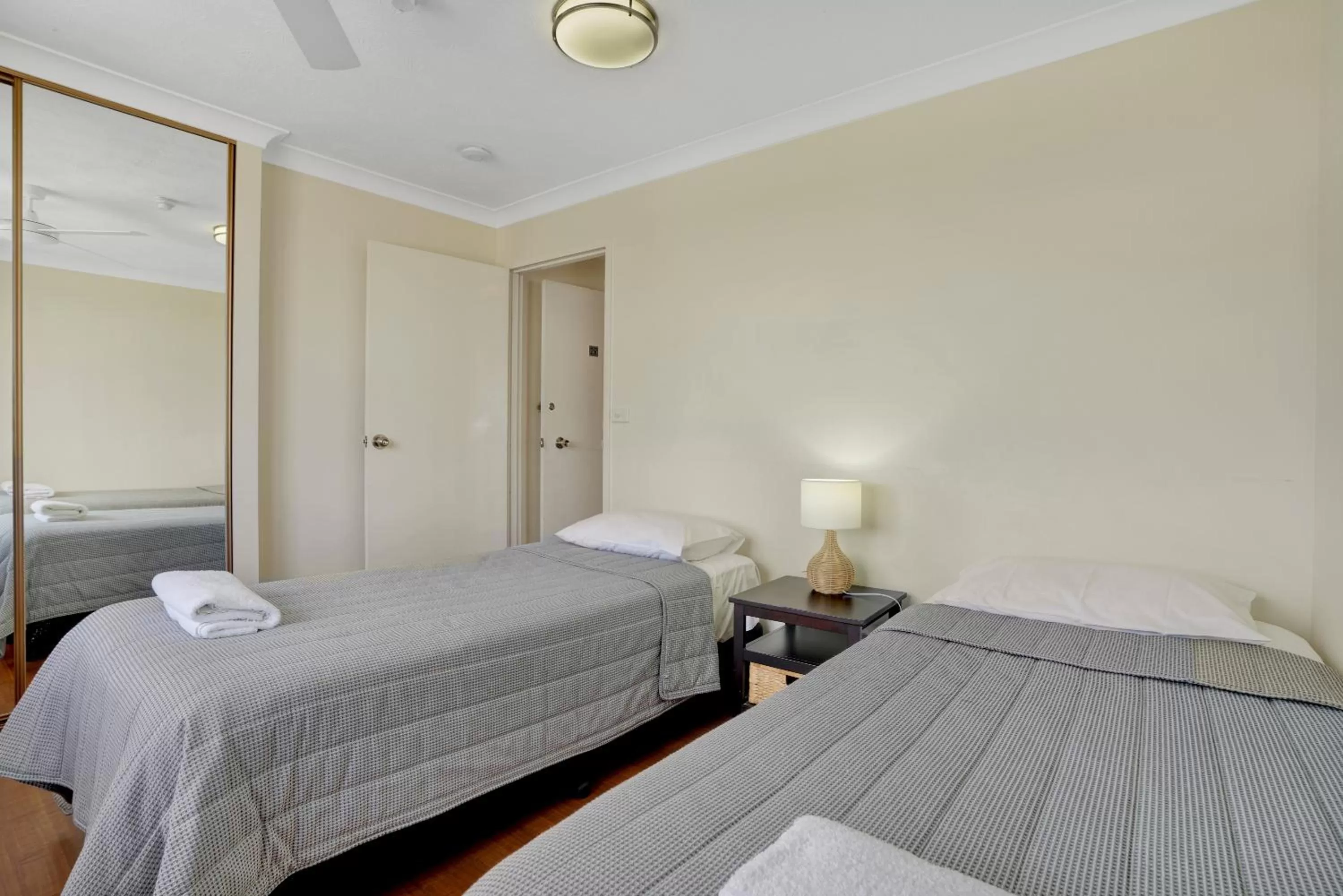 Bed in Beach Palms Holiday Apartments