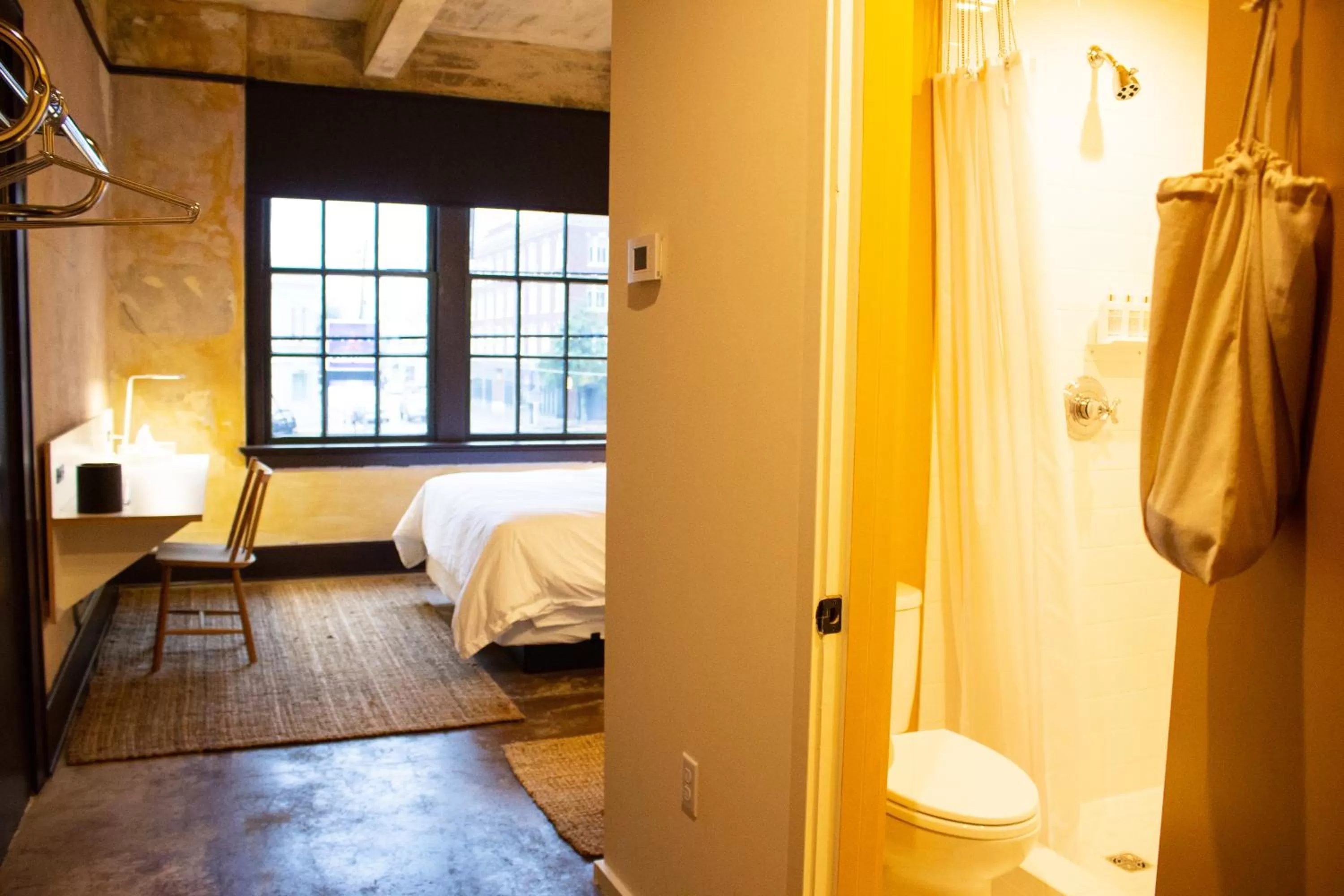 Bed in Travelers Hotel