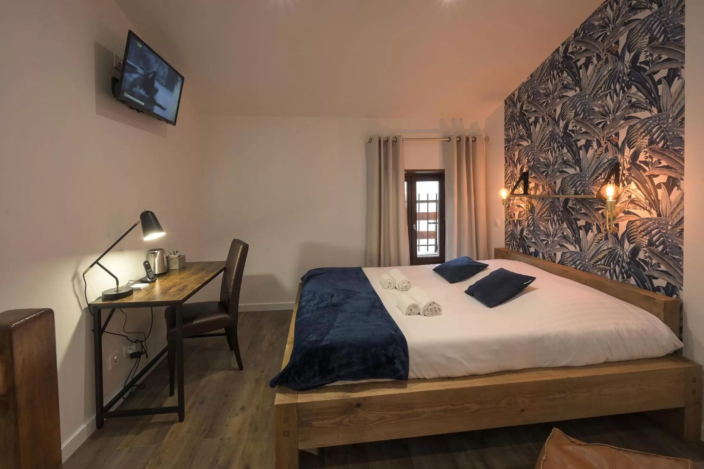 Bed in Hotel De La Croisée