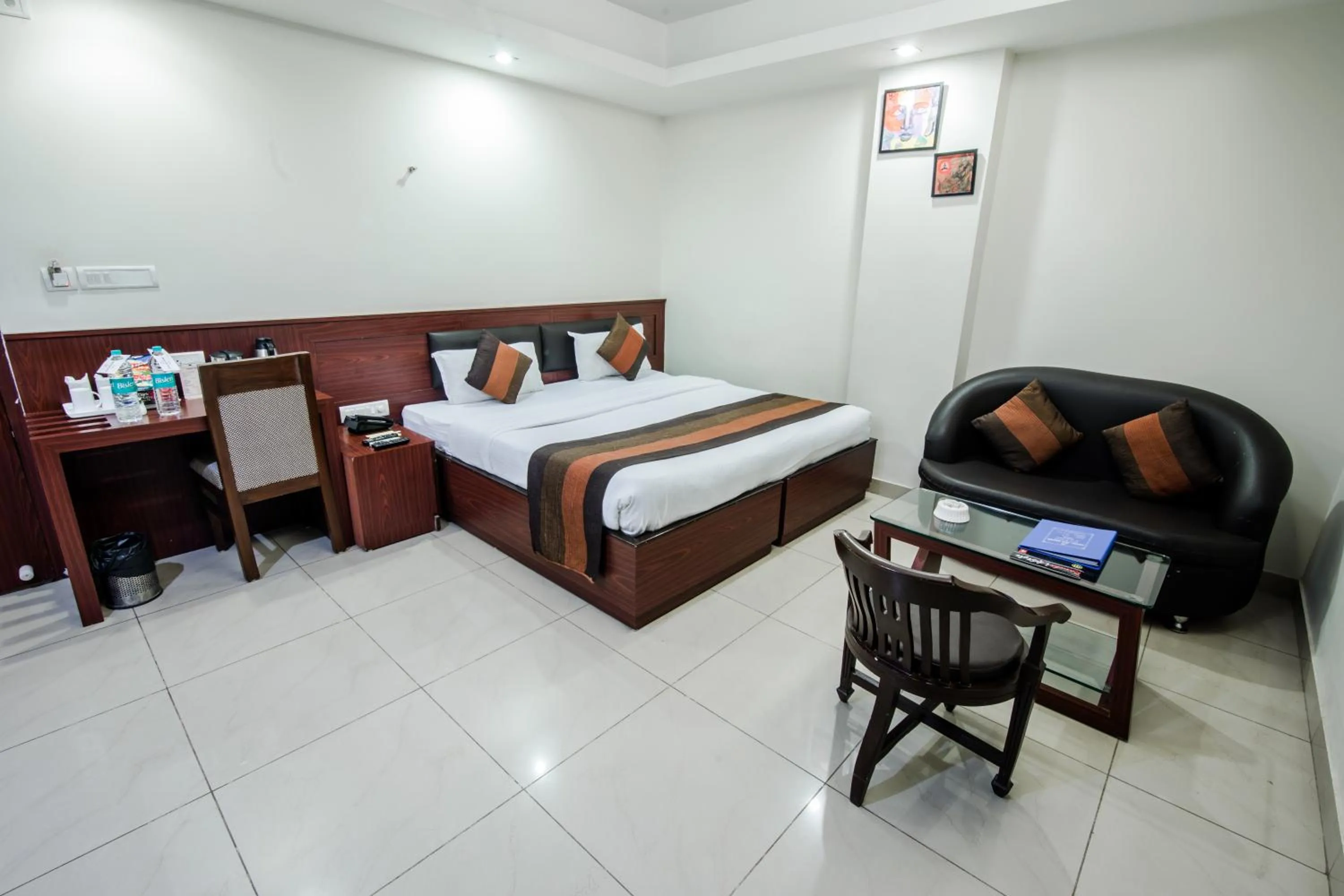 Photo of the whole room, Bed in HOTEL AVN GRAND