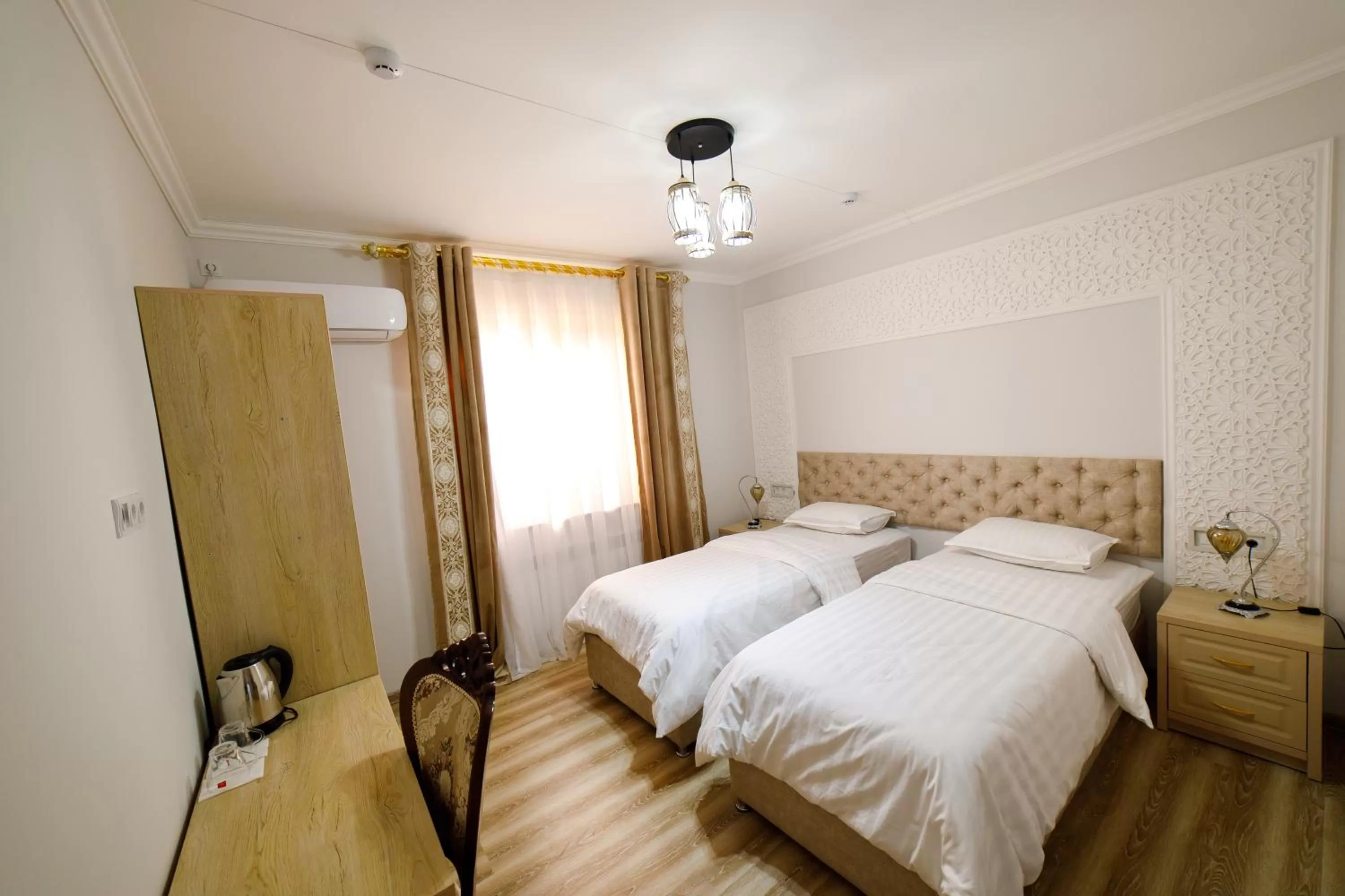 Bed in Khans Palace Hotel