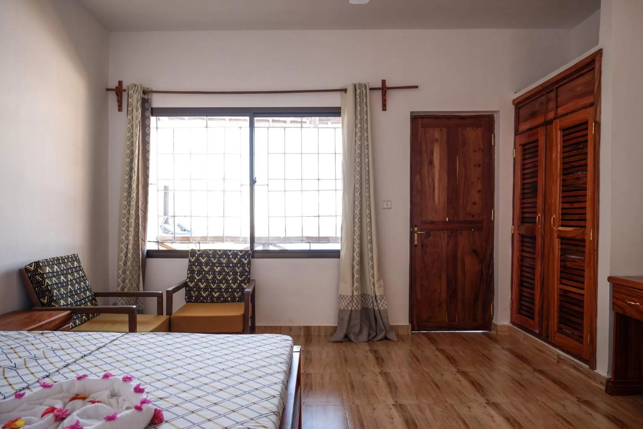 Living room, Bed in Nungwi Heritage Resort