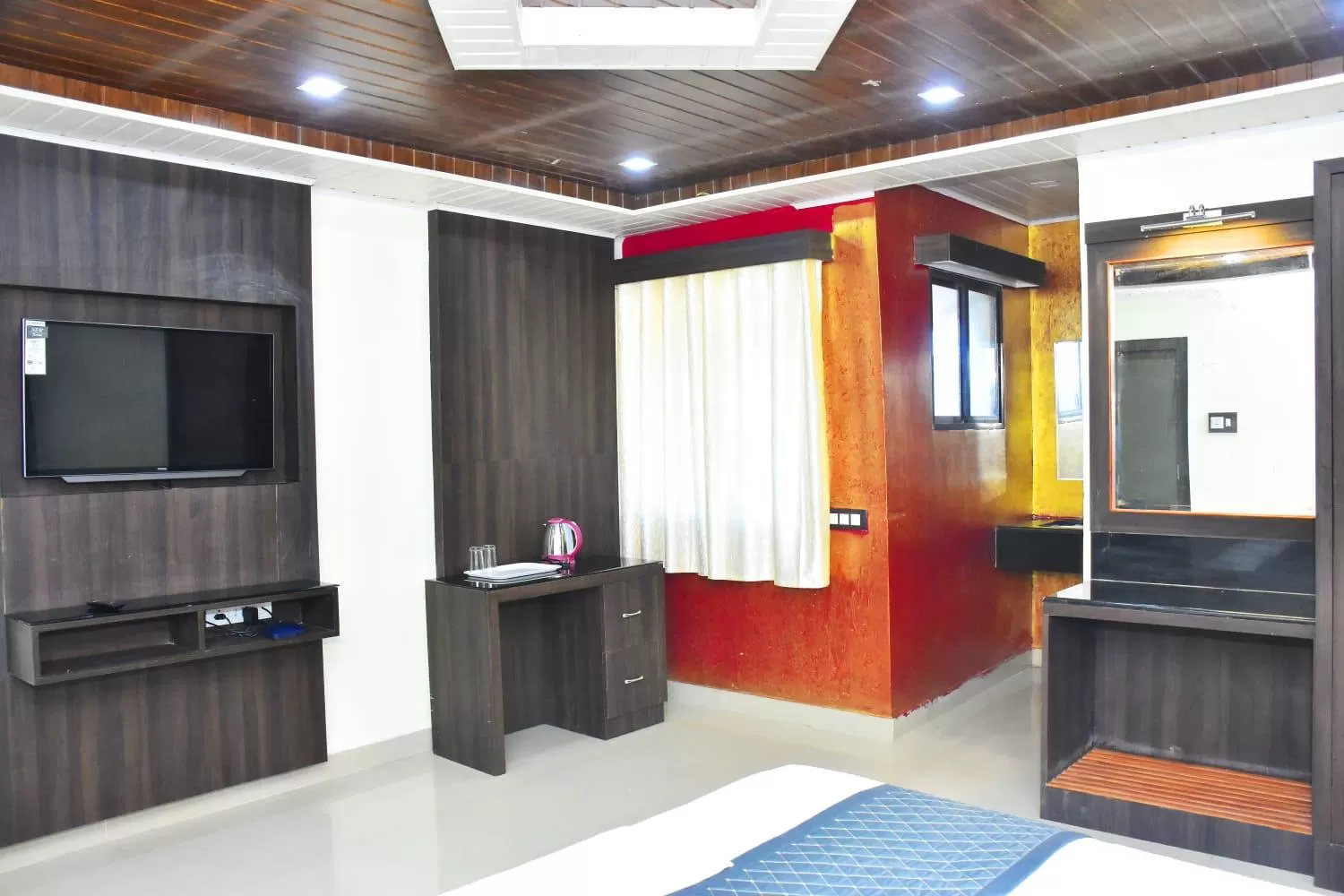 Communal lounge/ TV room in Hotel La Gowri, Coorg
