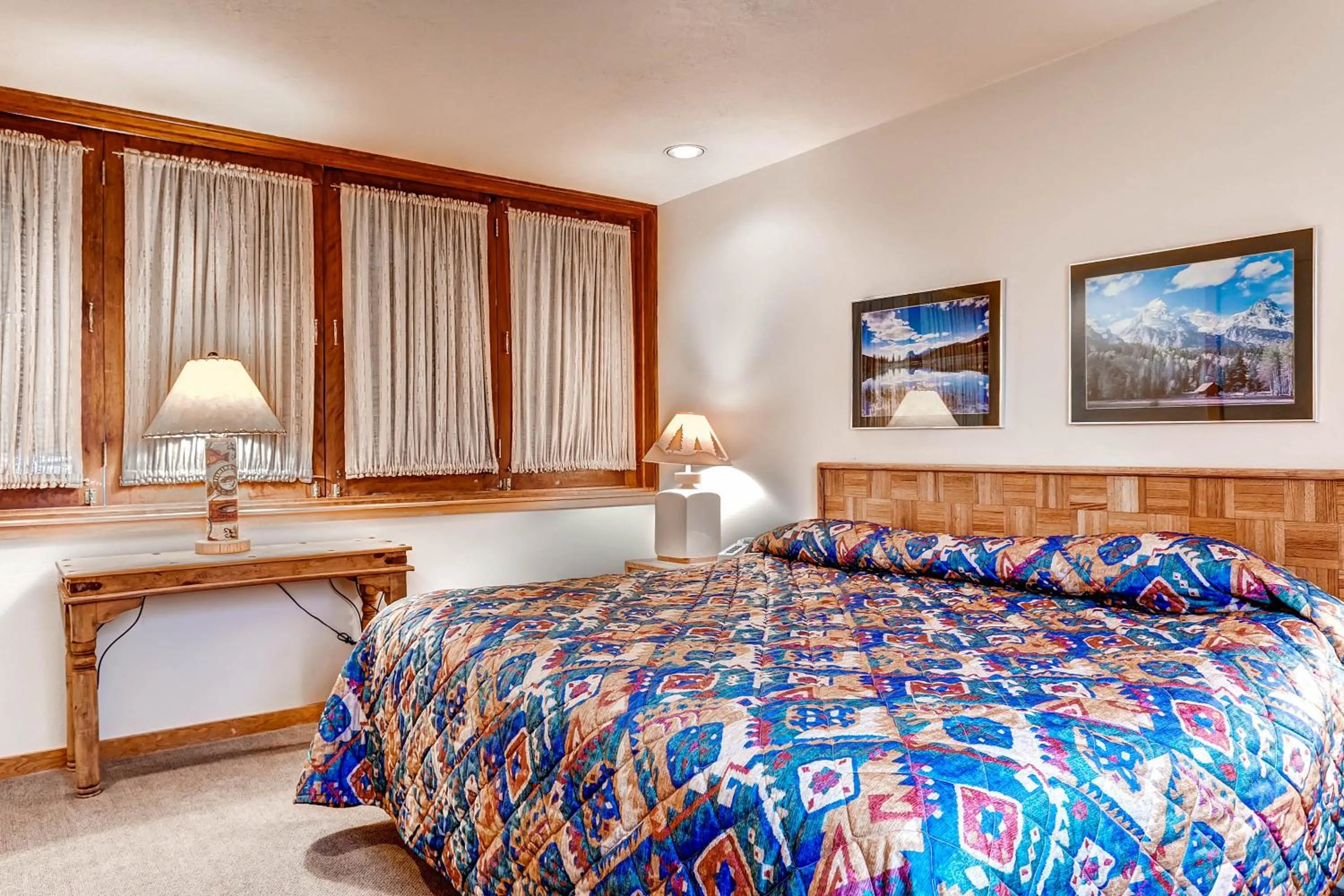 Bed in Evergreen Condominiums by Vail Resorts